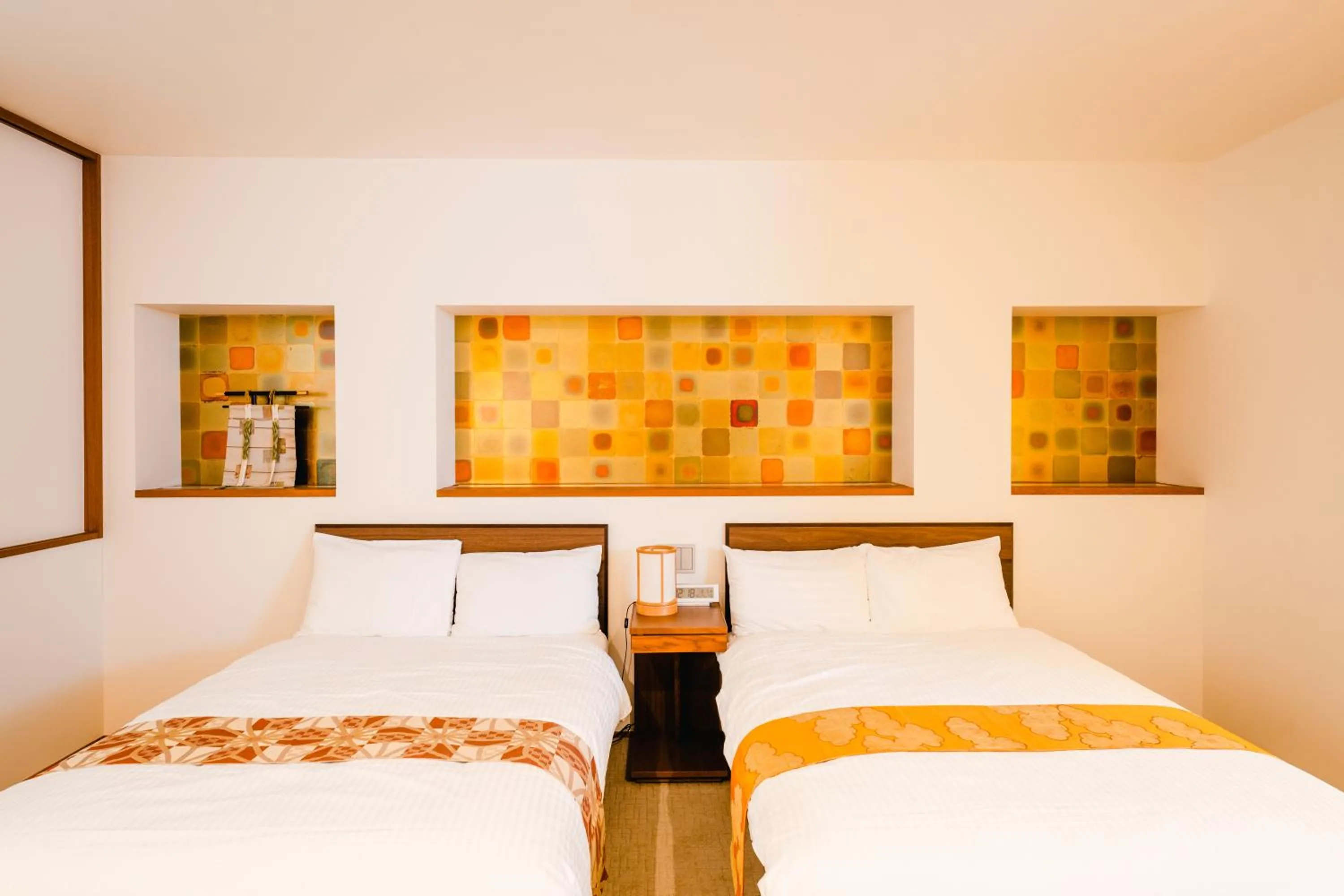 Bed in Hotel Rakurakuan