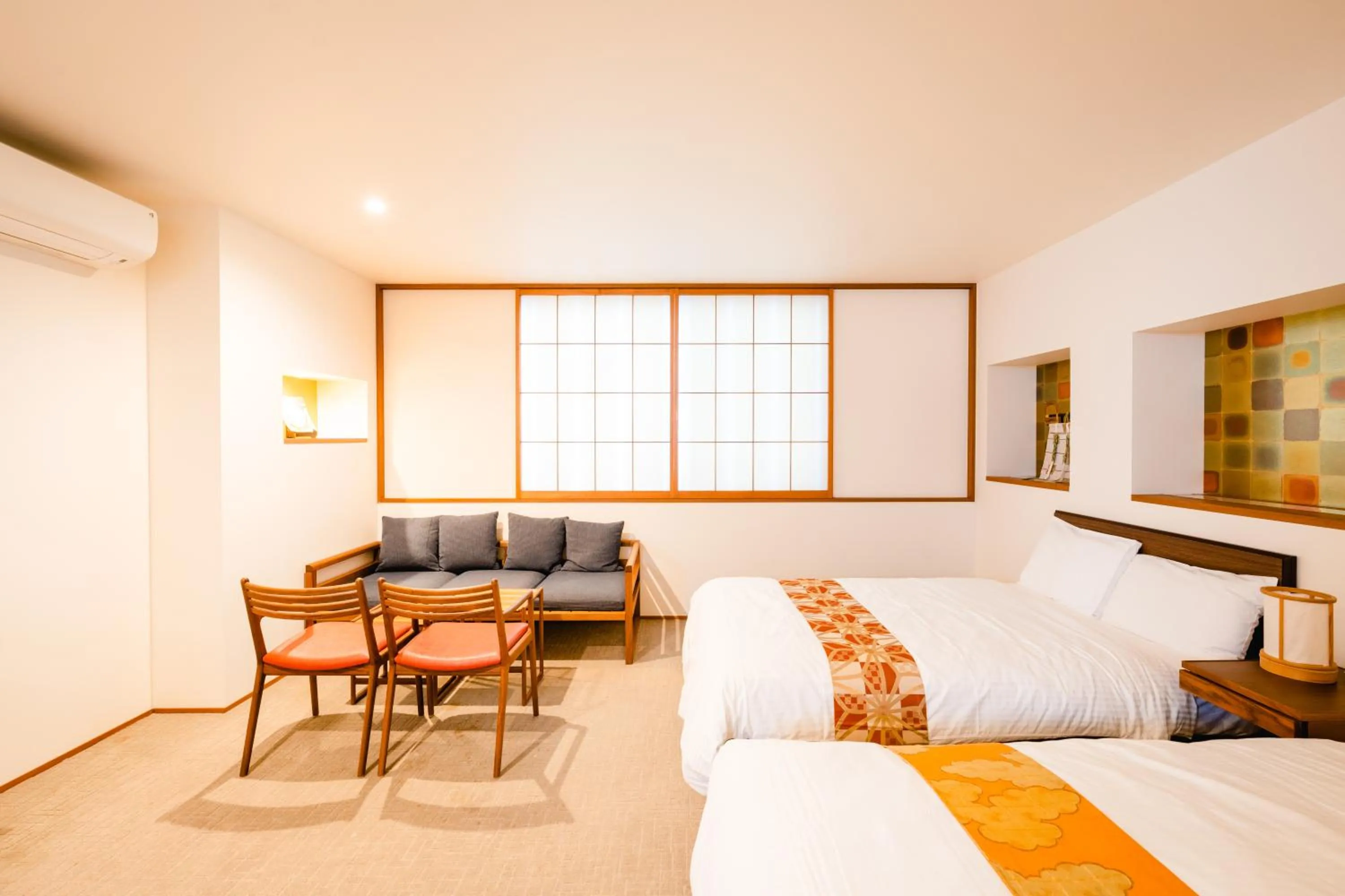 Bed in Hotel Rakurakuan