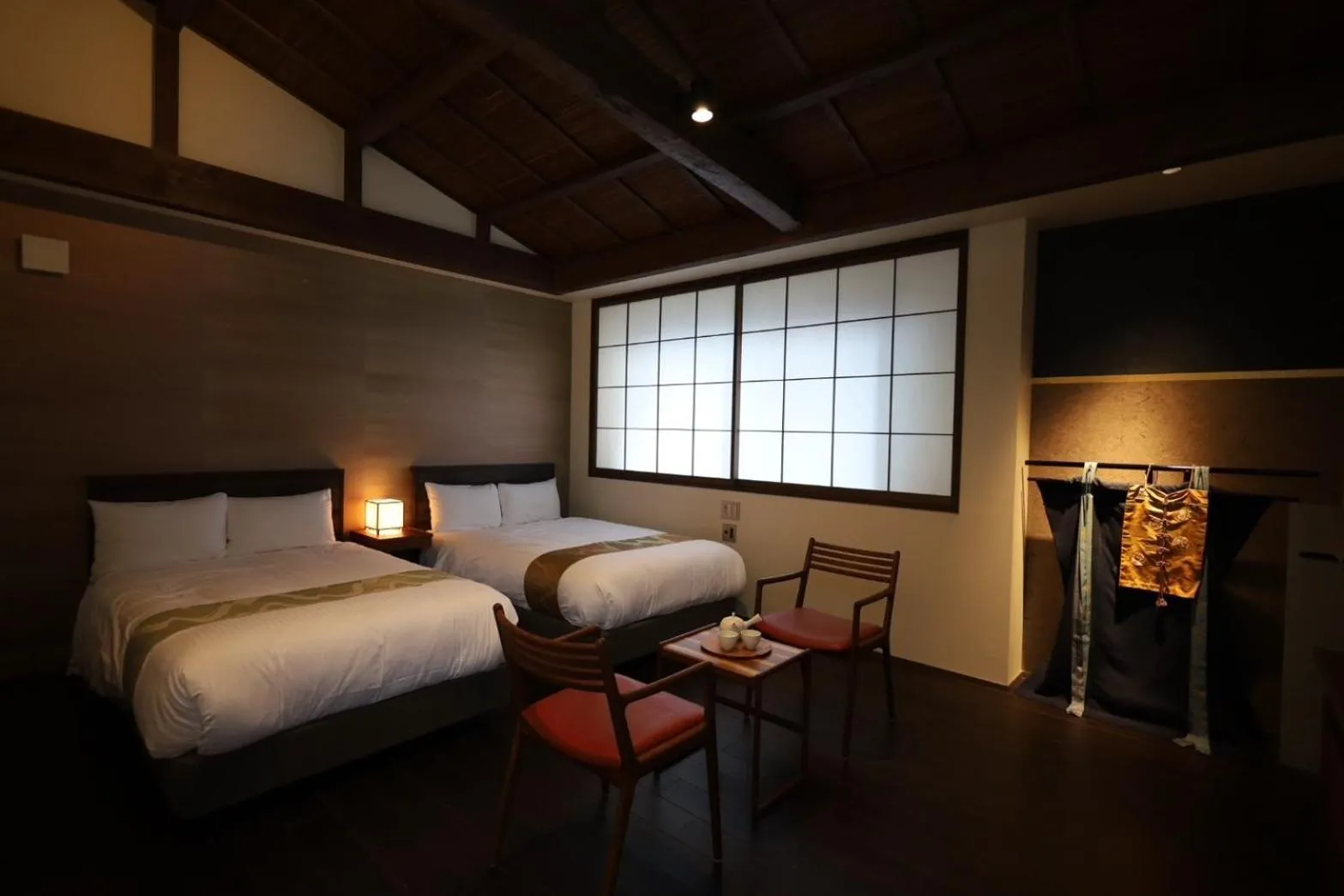 Bed in Hotel Rakurakuan