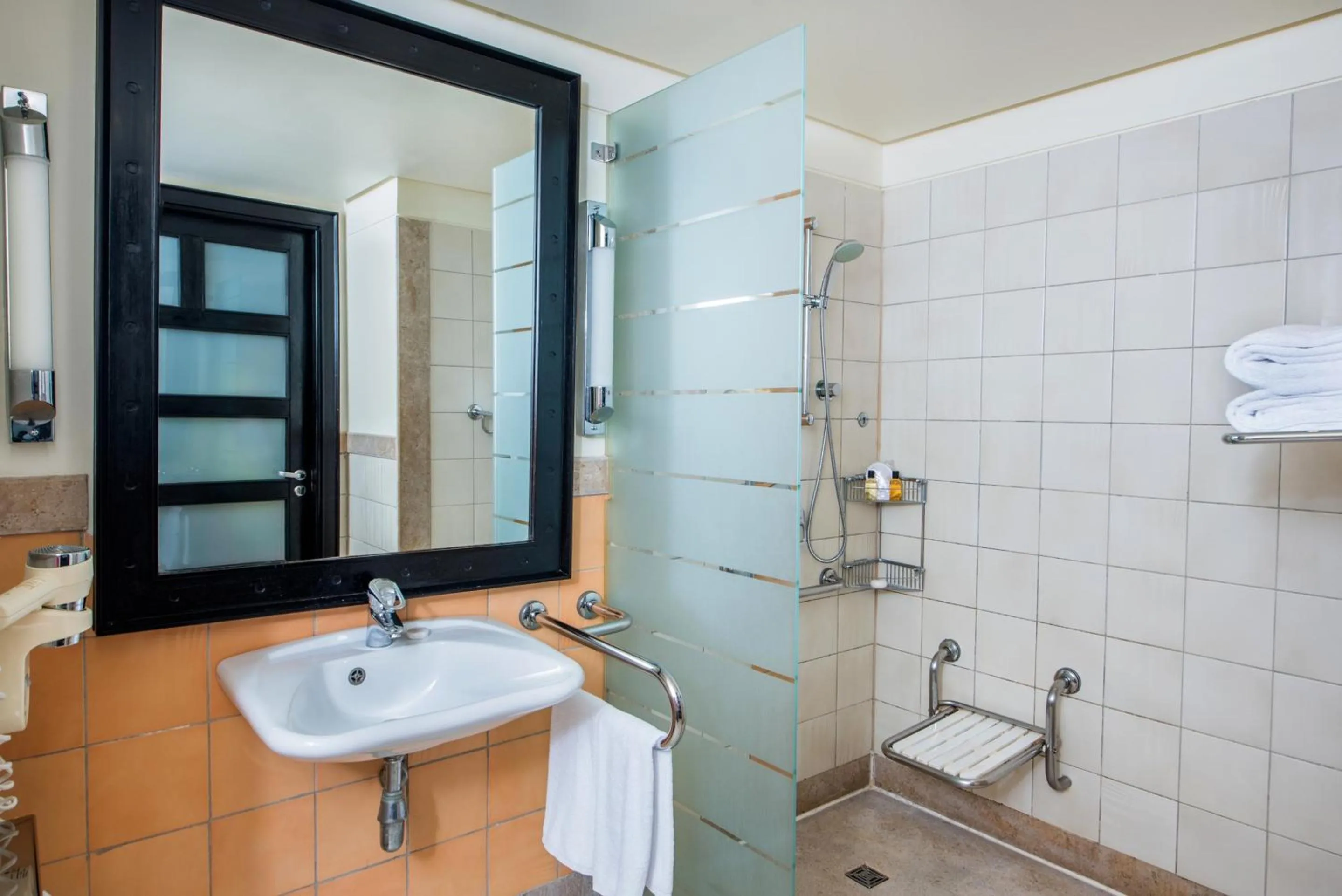 Bathroom in Reef Oasis Blue Bay Resort & Spa