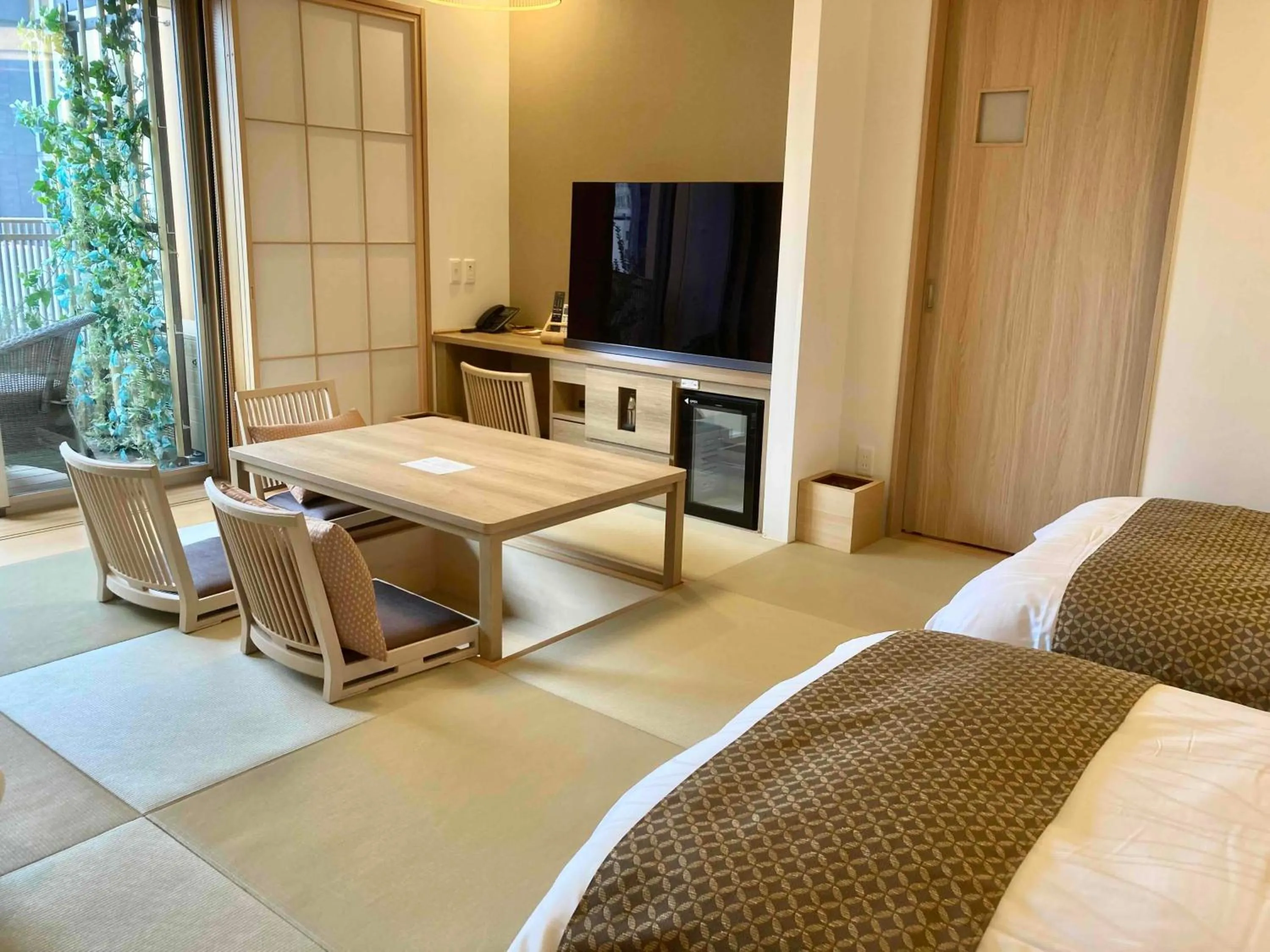 Communal lounge/ TV room, Bed in Dormy Inn Premium Ginza - Natural Hot Spring