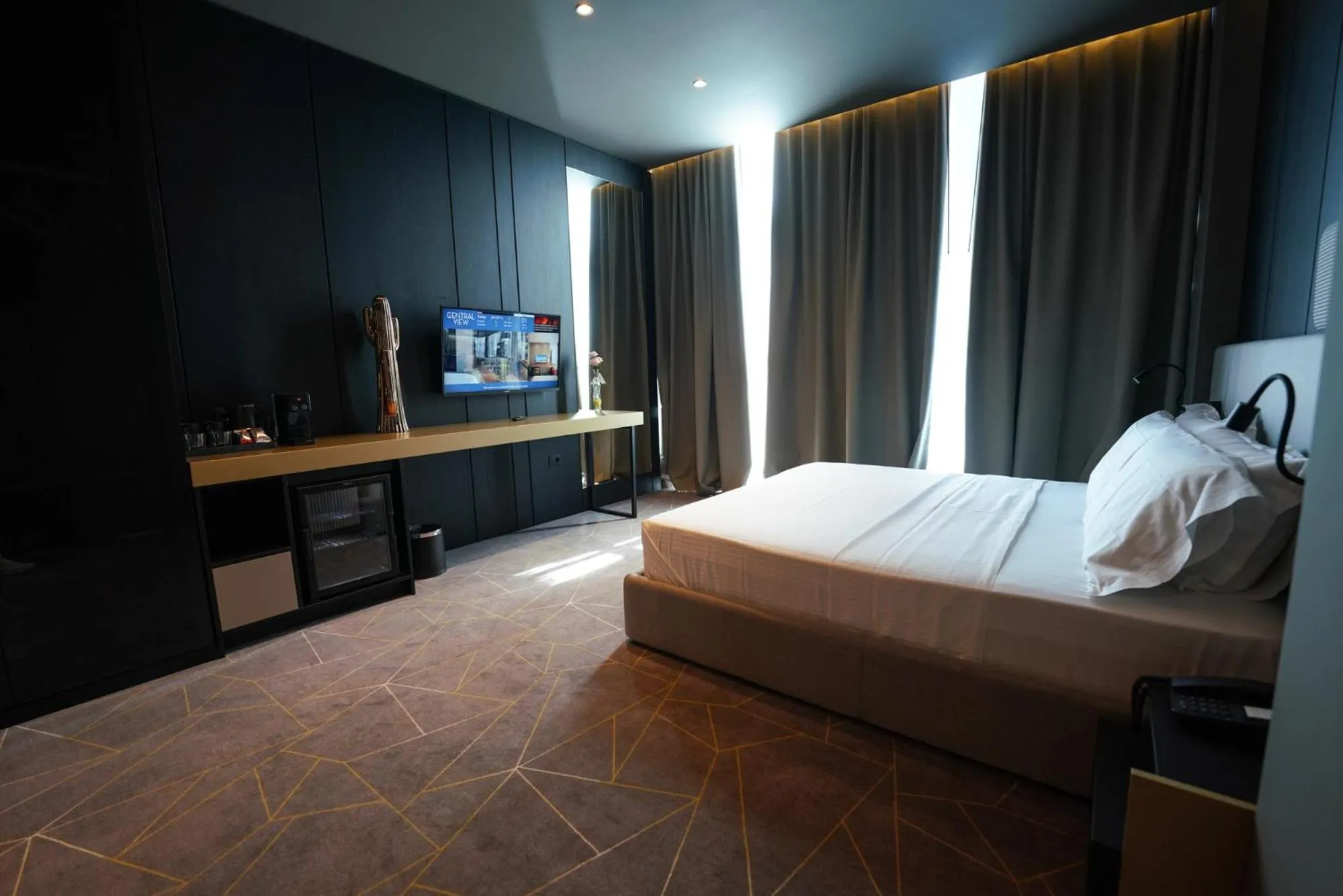 Photo of the whole room, Bed in The Central View Boutique Hotel
