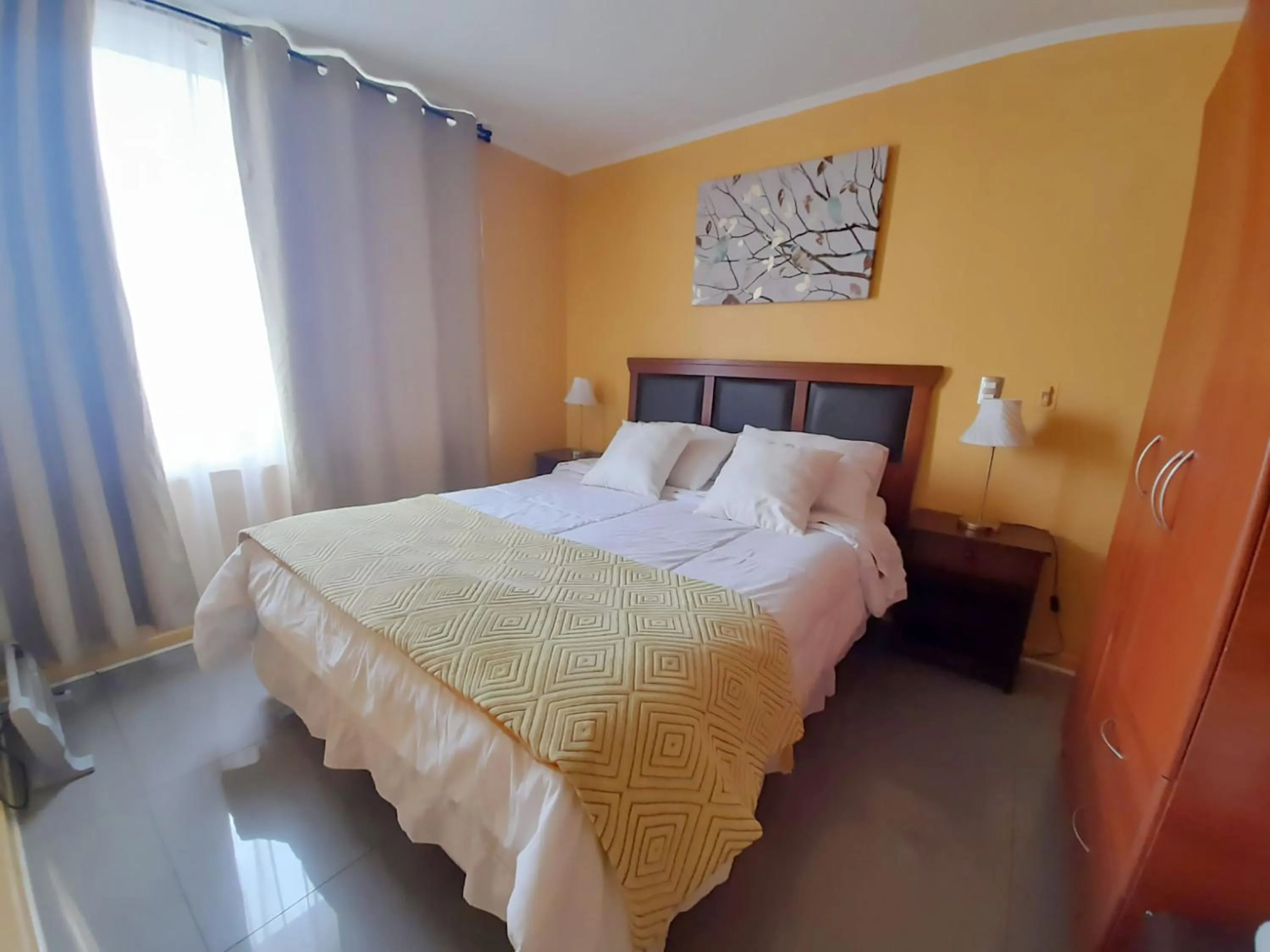 Decorative detail, Bed in VIP Apartments Chile