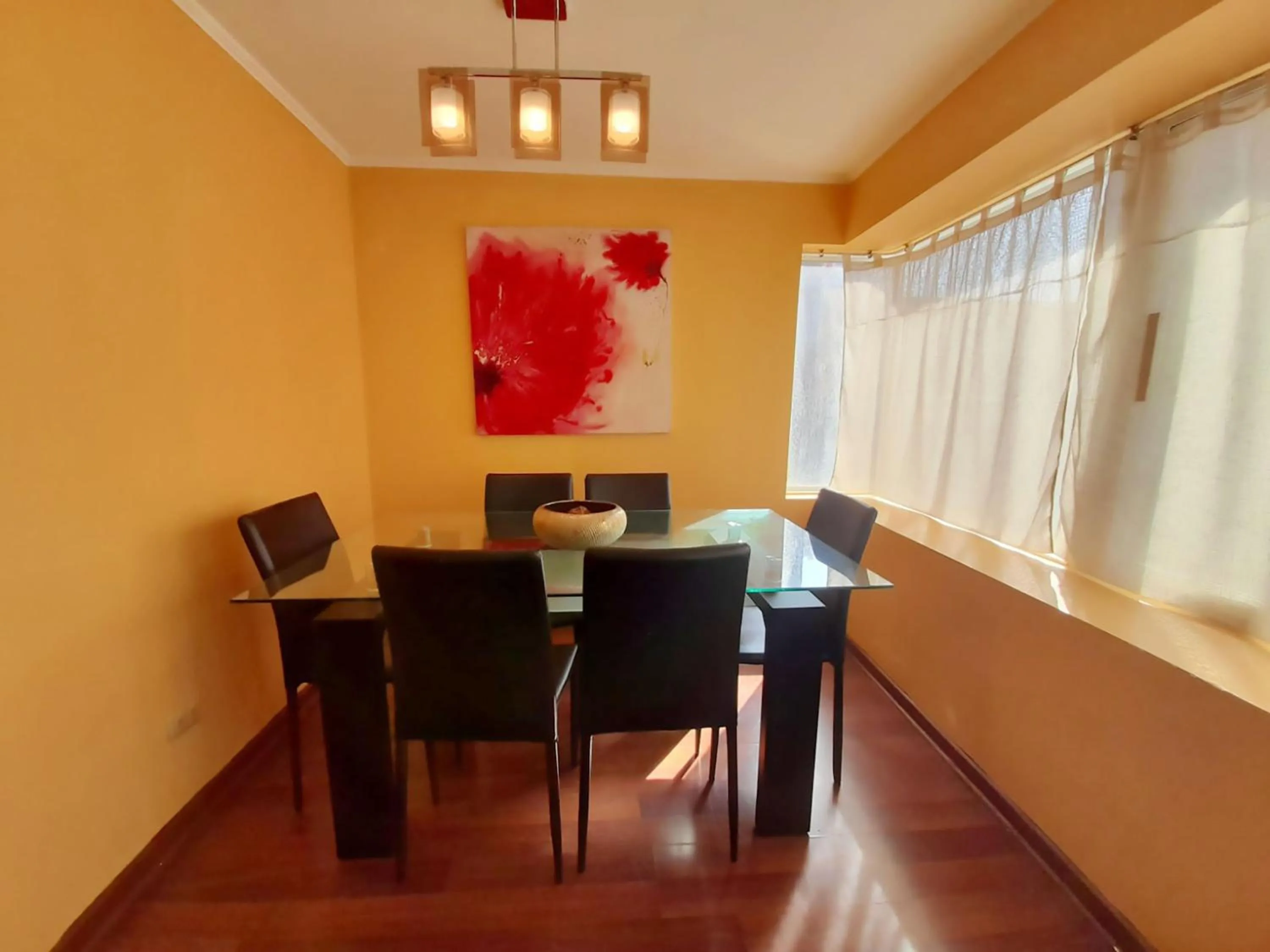 Dining area in VIP Apartments Chile