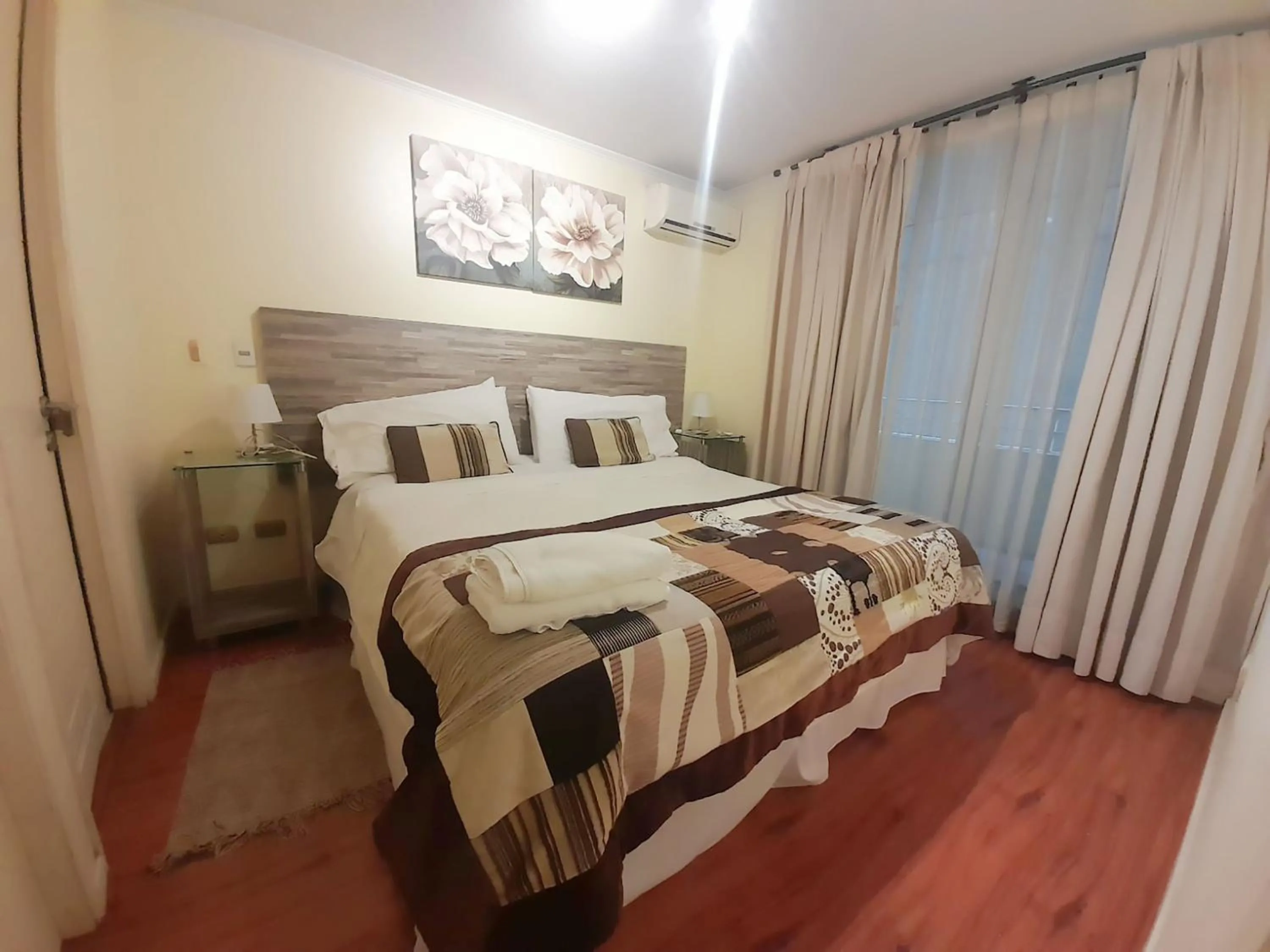 Decorative detail, Bed in VIP Apartments Chile