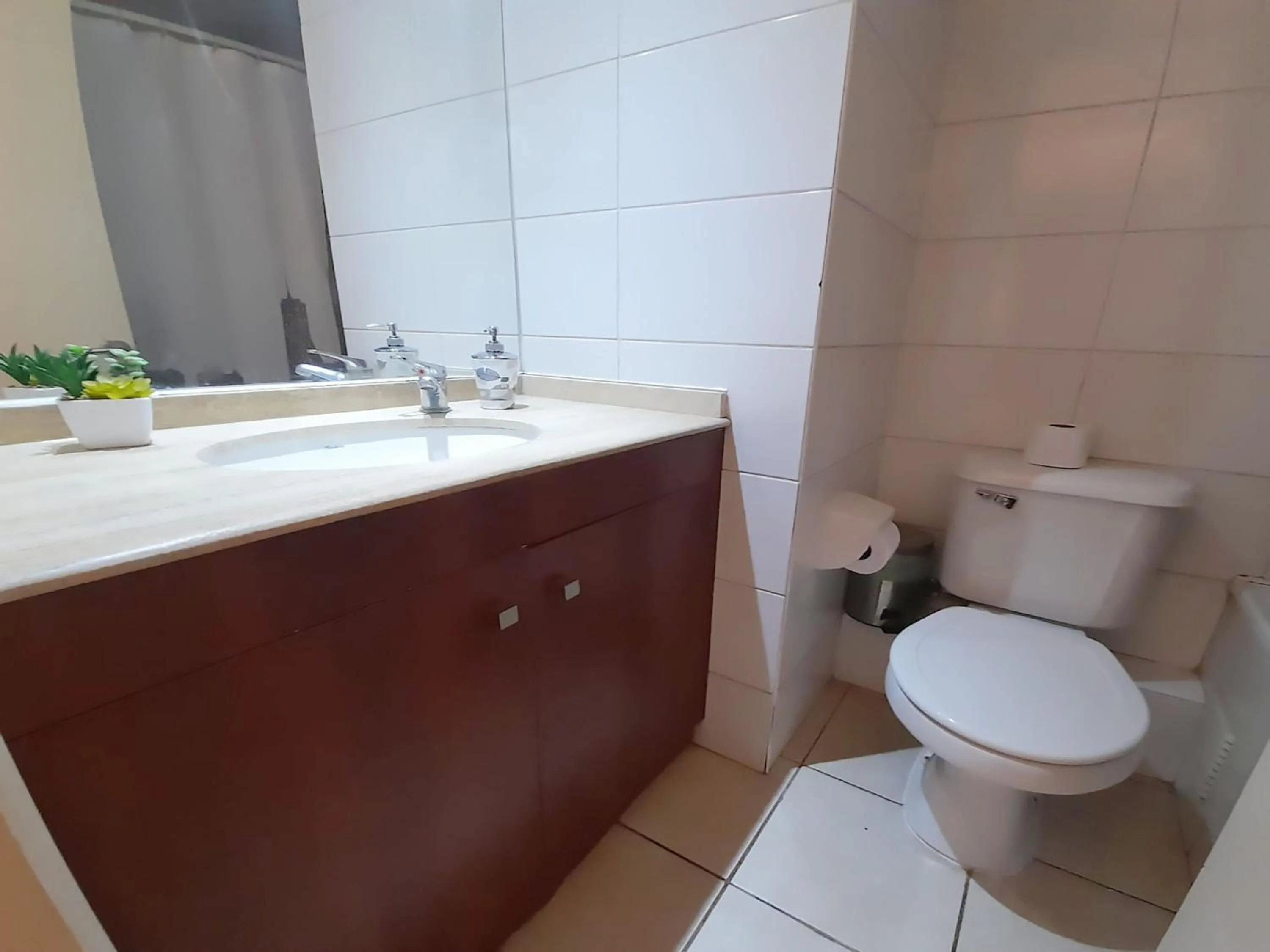 Bathroom in VIP Apartments Chile