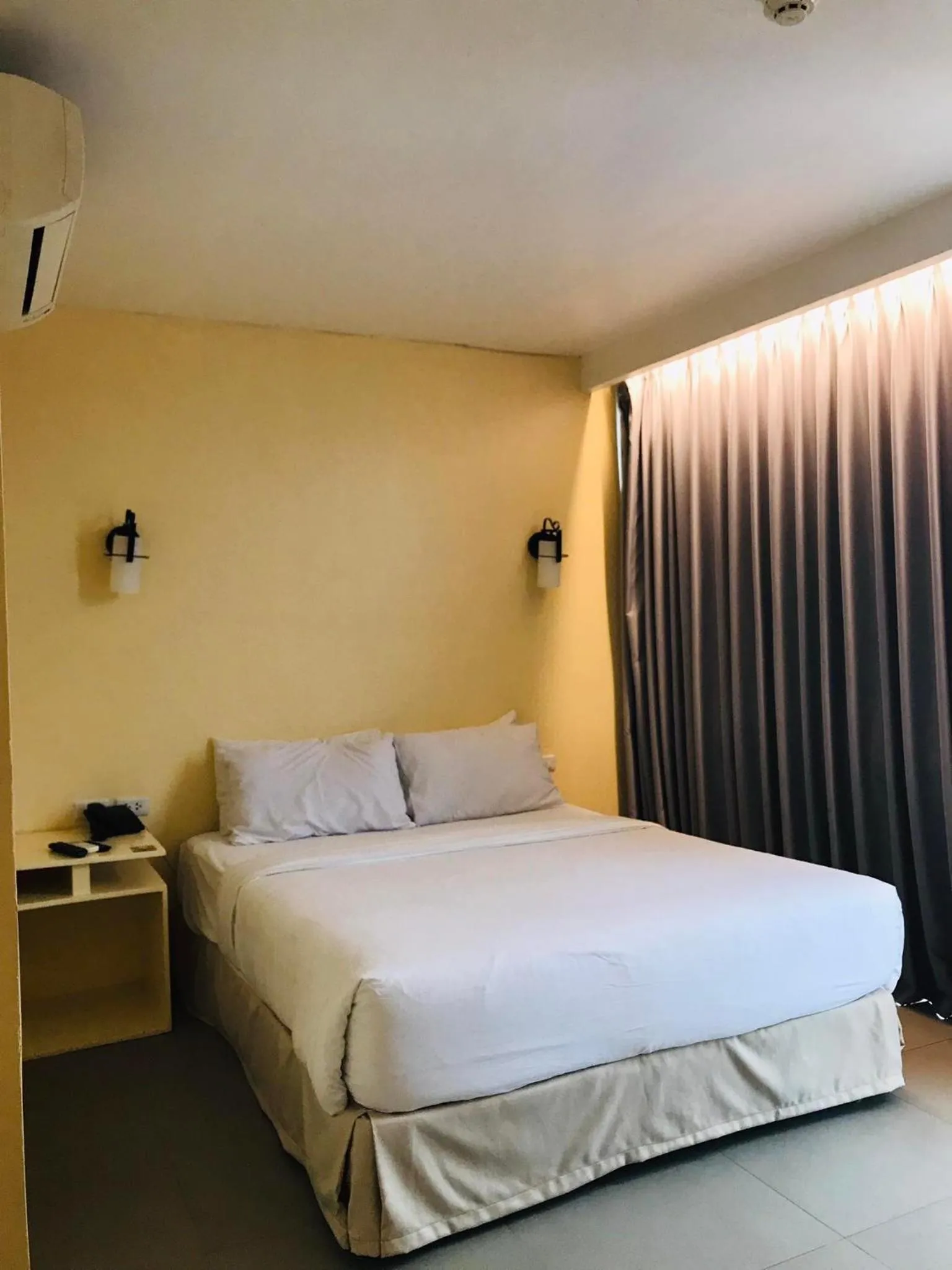 Bed in Dosi Hotel PH