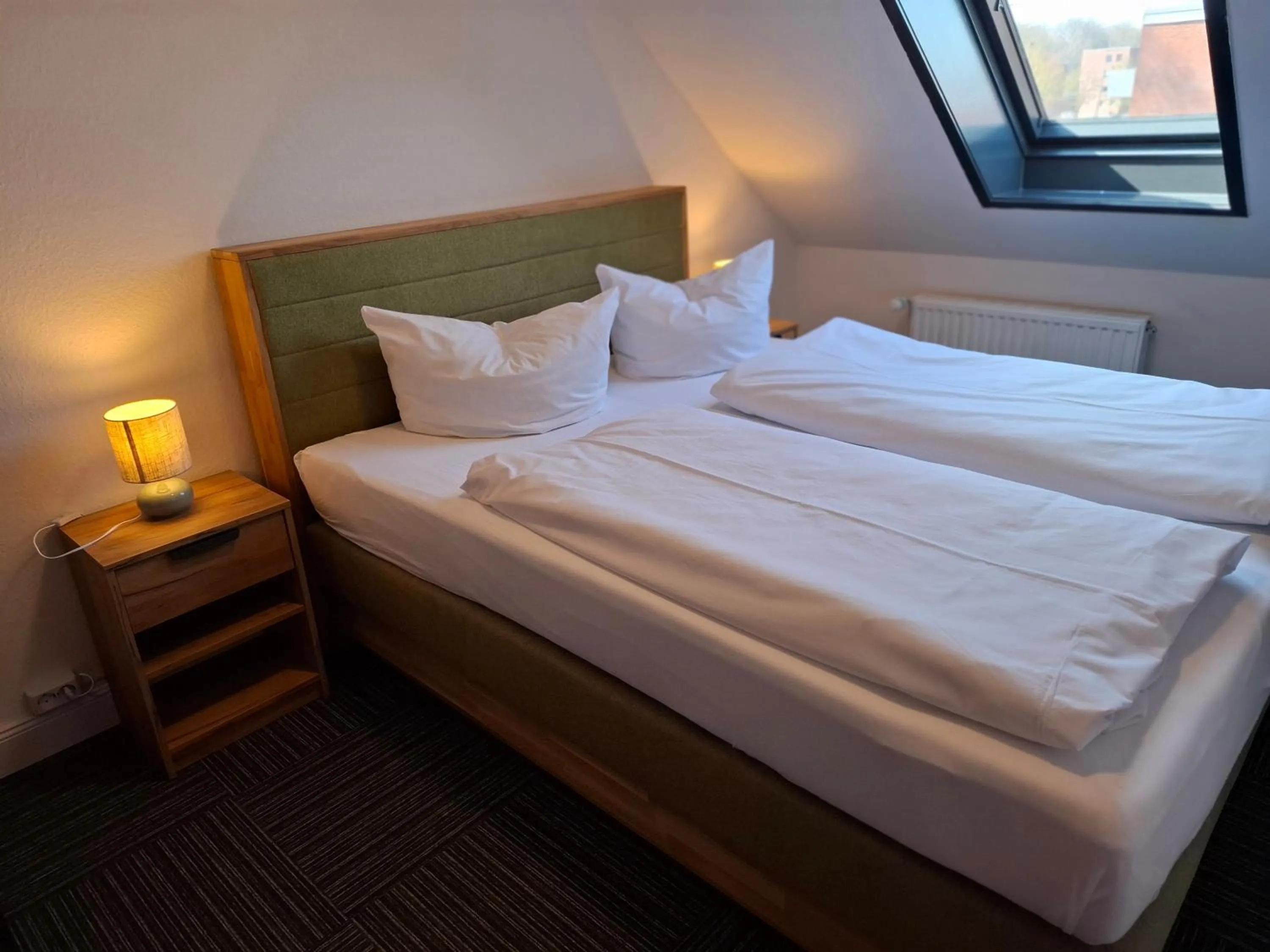 Photo of the whole room, Bed in Hotel Am Schwarzen Berg