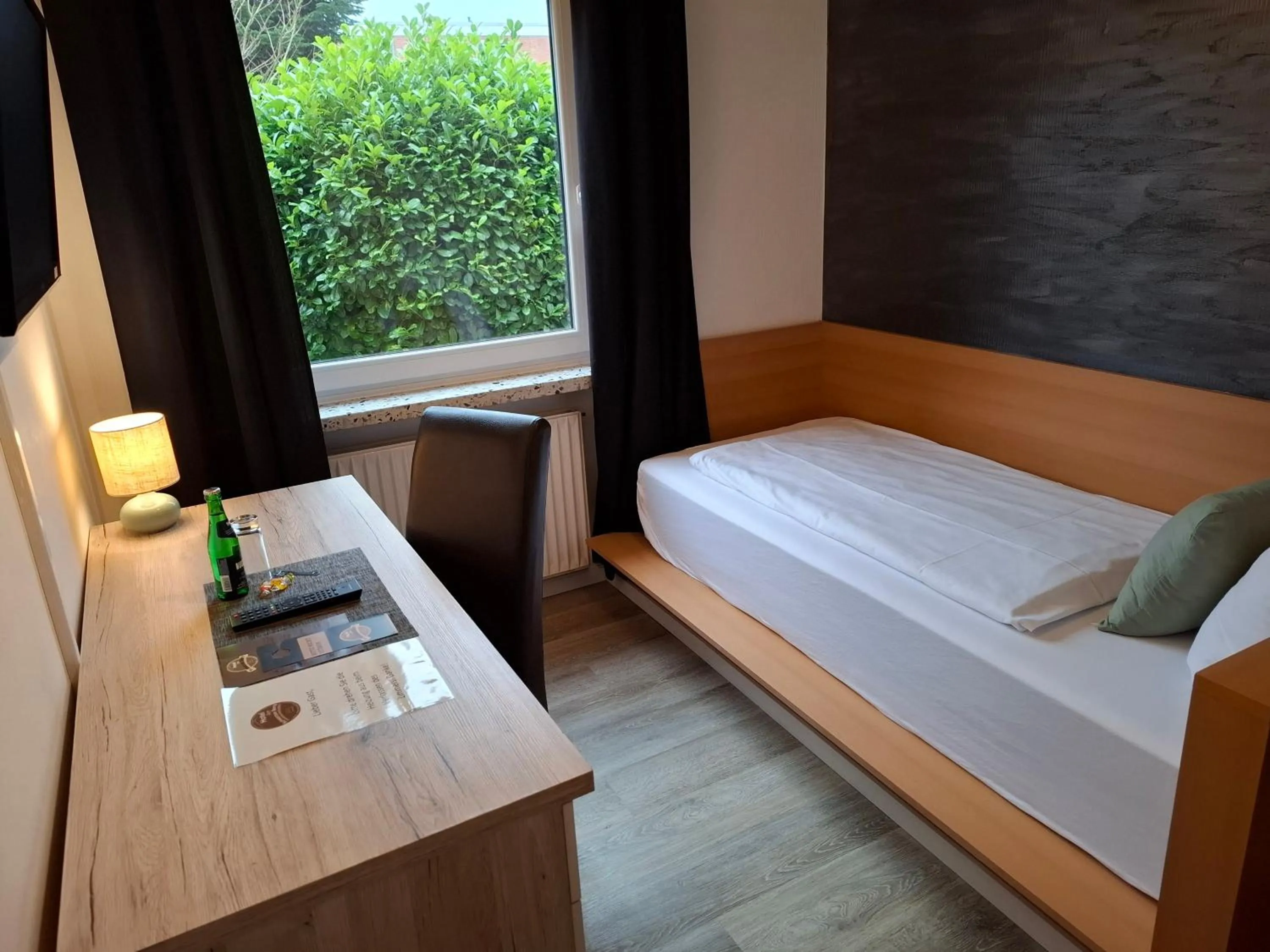 Photo of the whole room, Bed in Hotel Am Schwarzen Berg