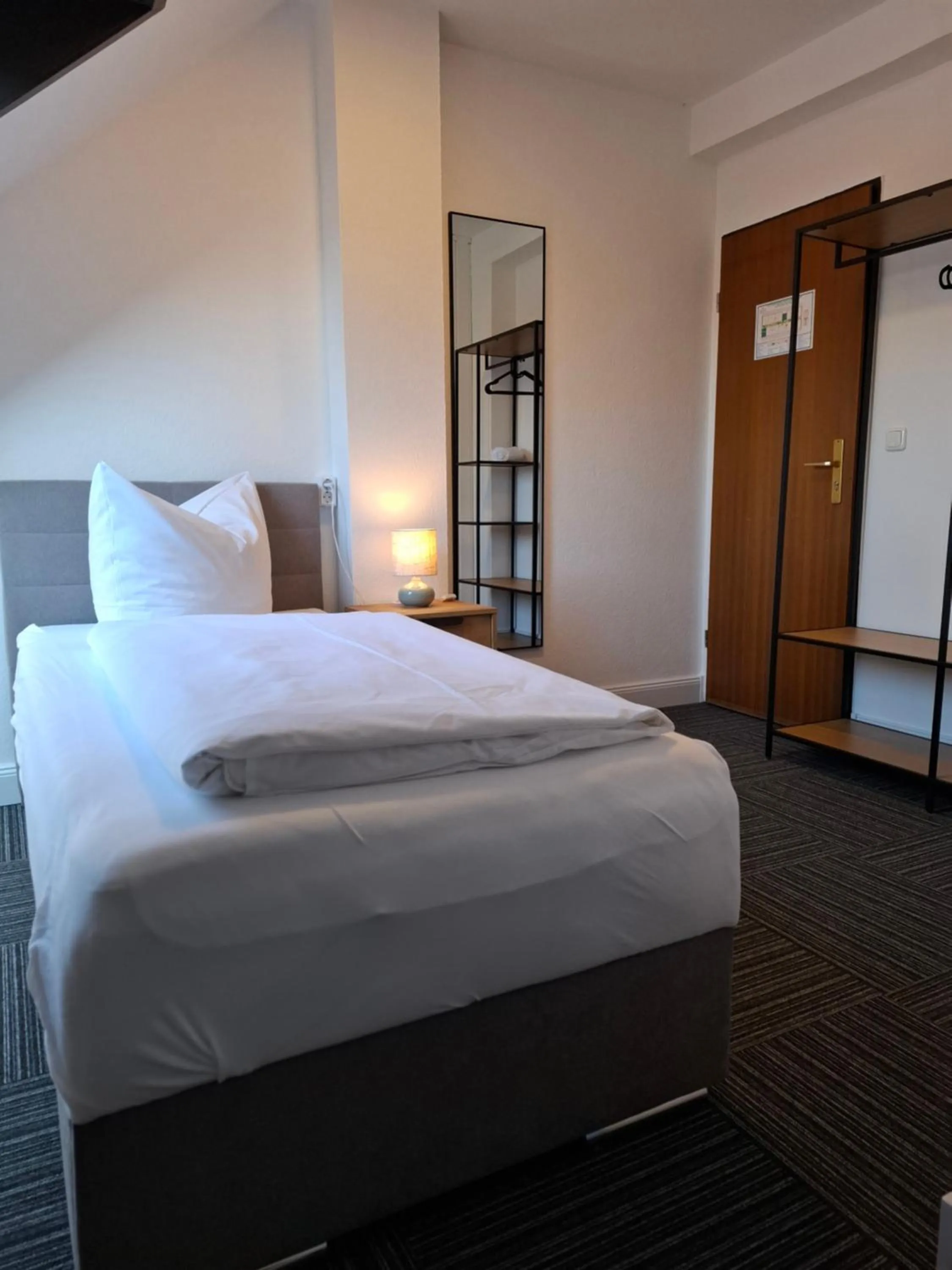 Photo of the whole room, Bed in Hotel Am Schwarzen Berg