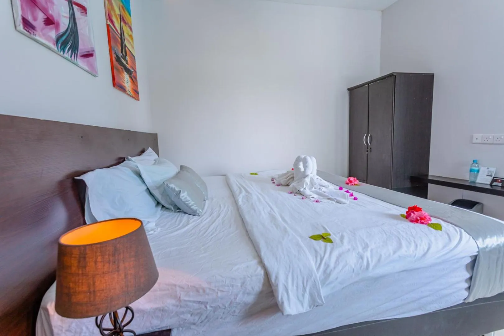 Bed in Violet Inn Hotel