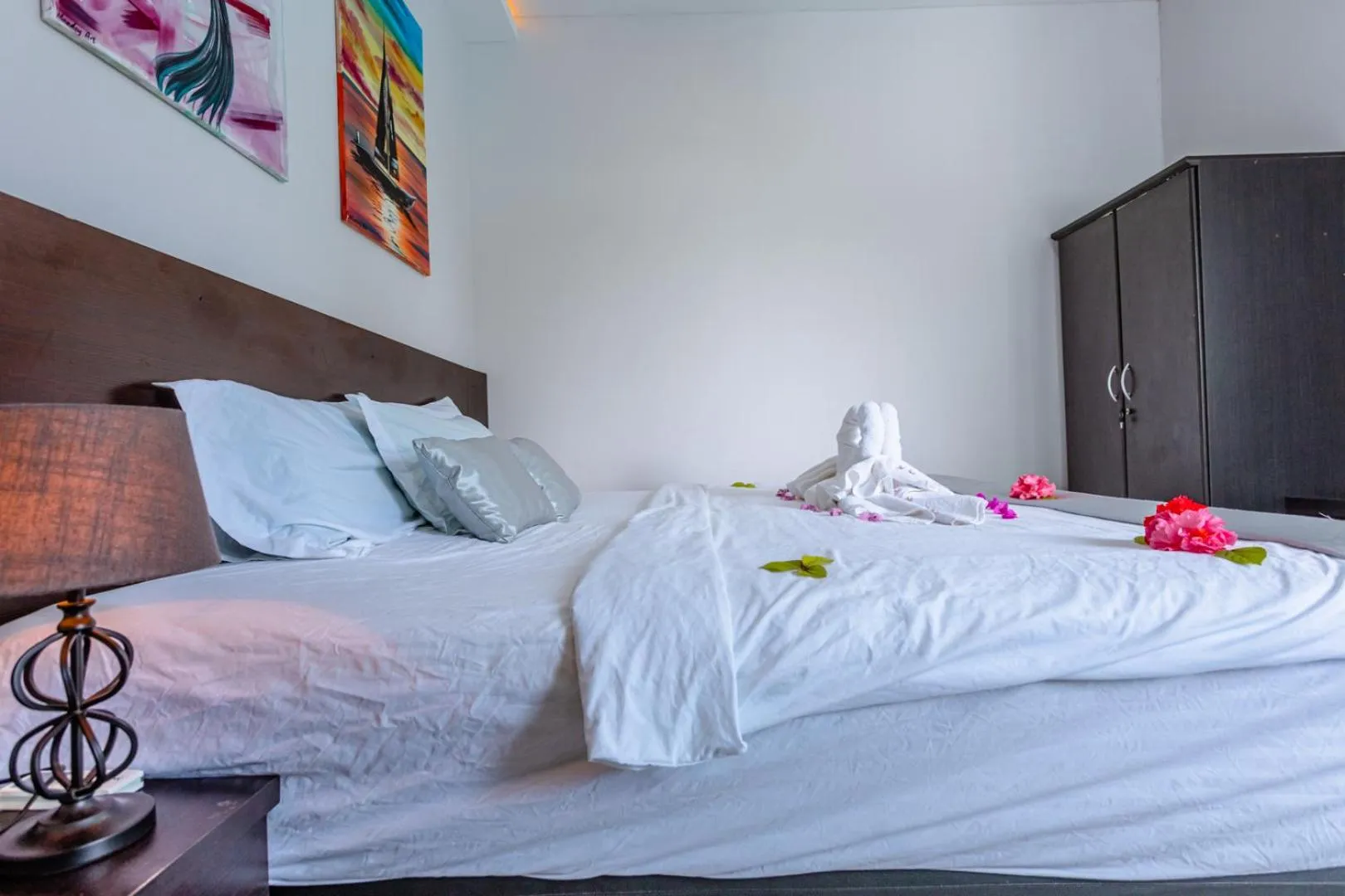 Bed in Violet Inn Hotel