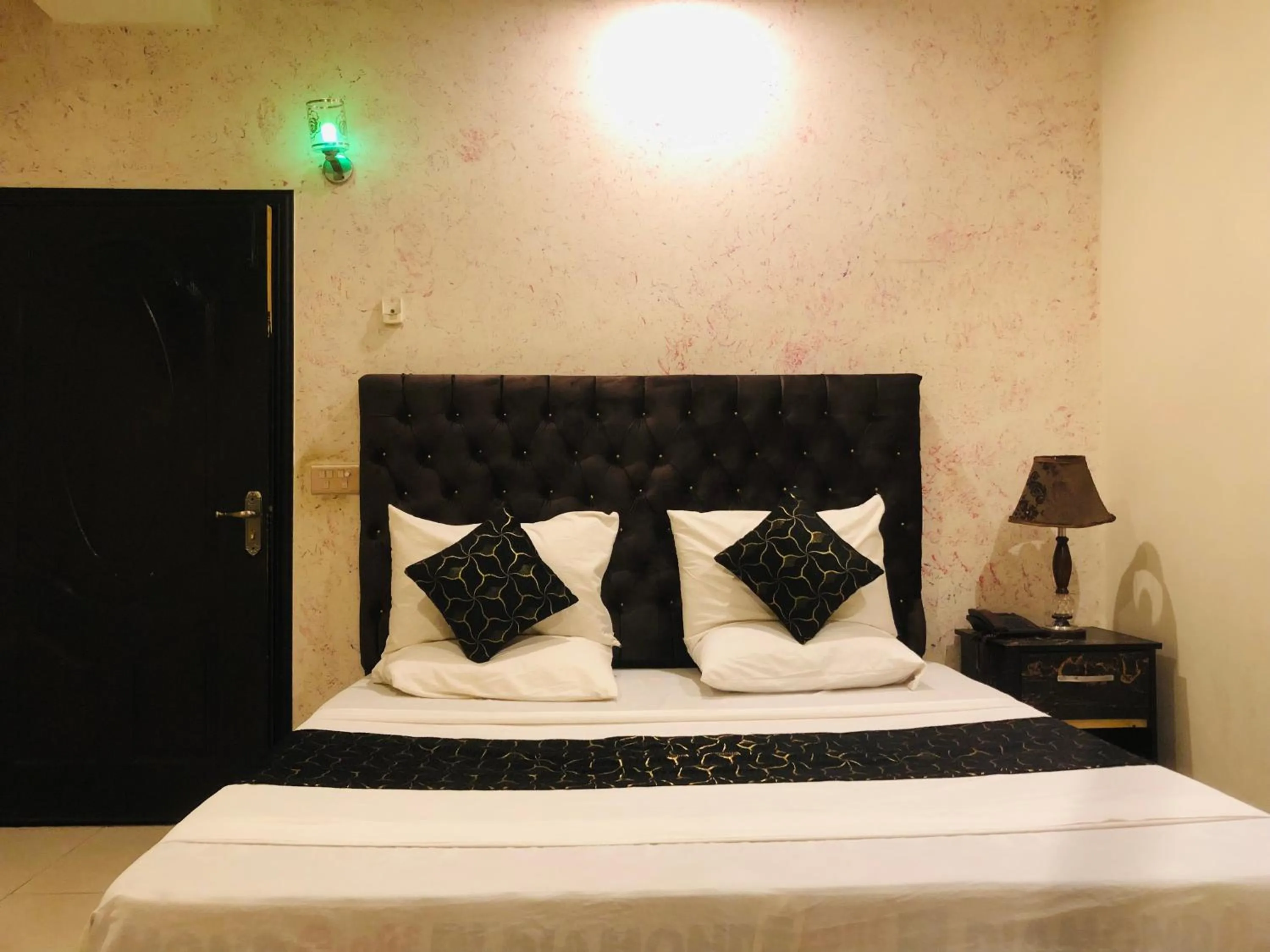 Bed in Hotel Tulip Inn