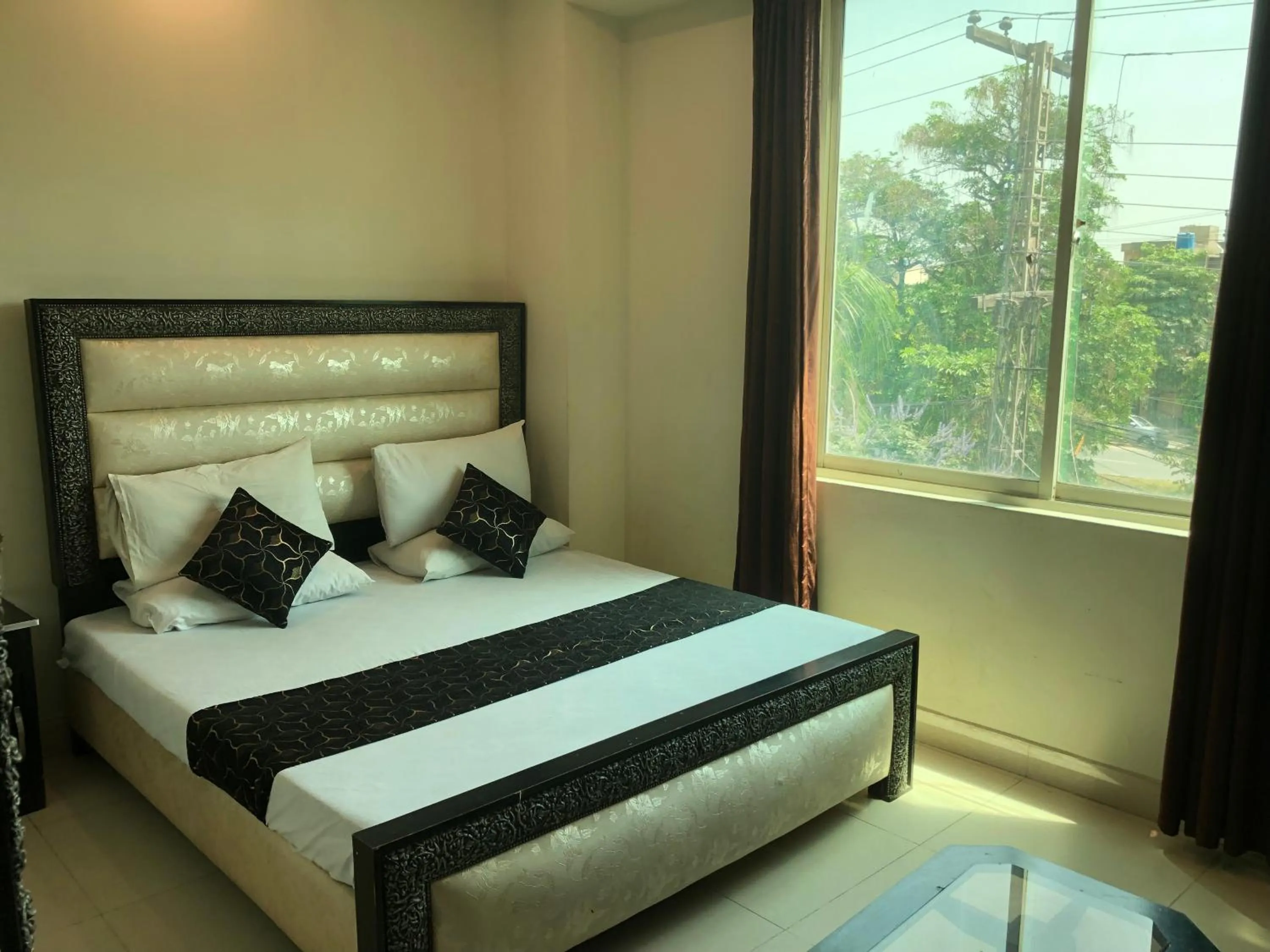 Bed in Hotel Tulip Inn