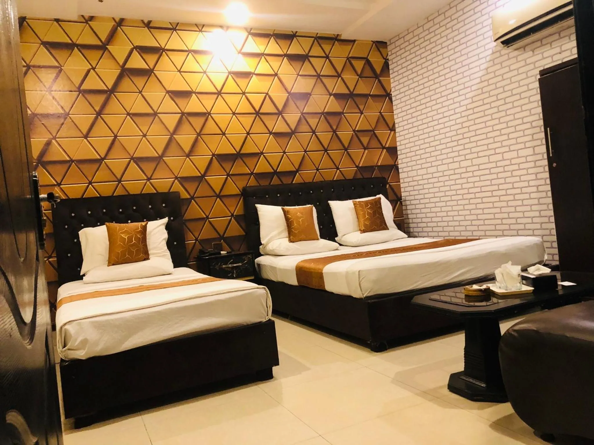 Bed in Hotel Tulip Inn