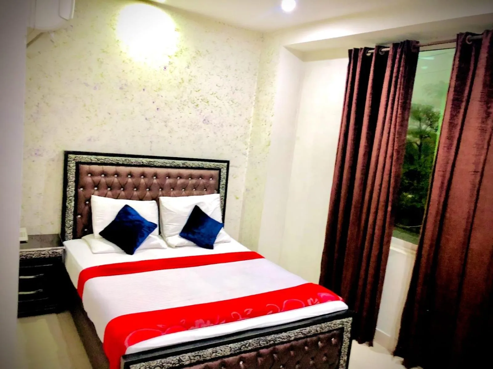 Bed in Hotel Tulip Inn