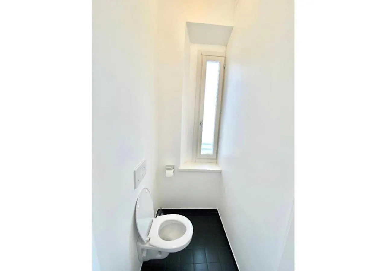 Bathroom in BRIBANO HOSTEL & bike sharing-workers and tourists hospitality