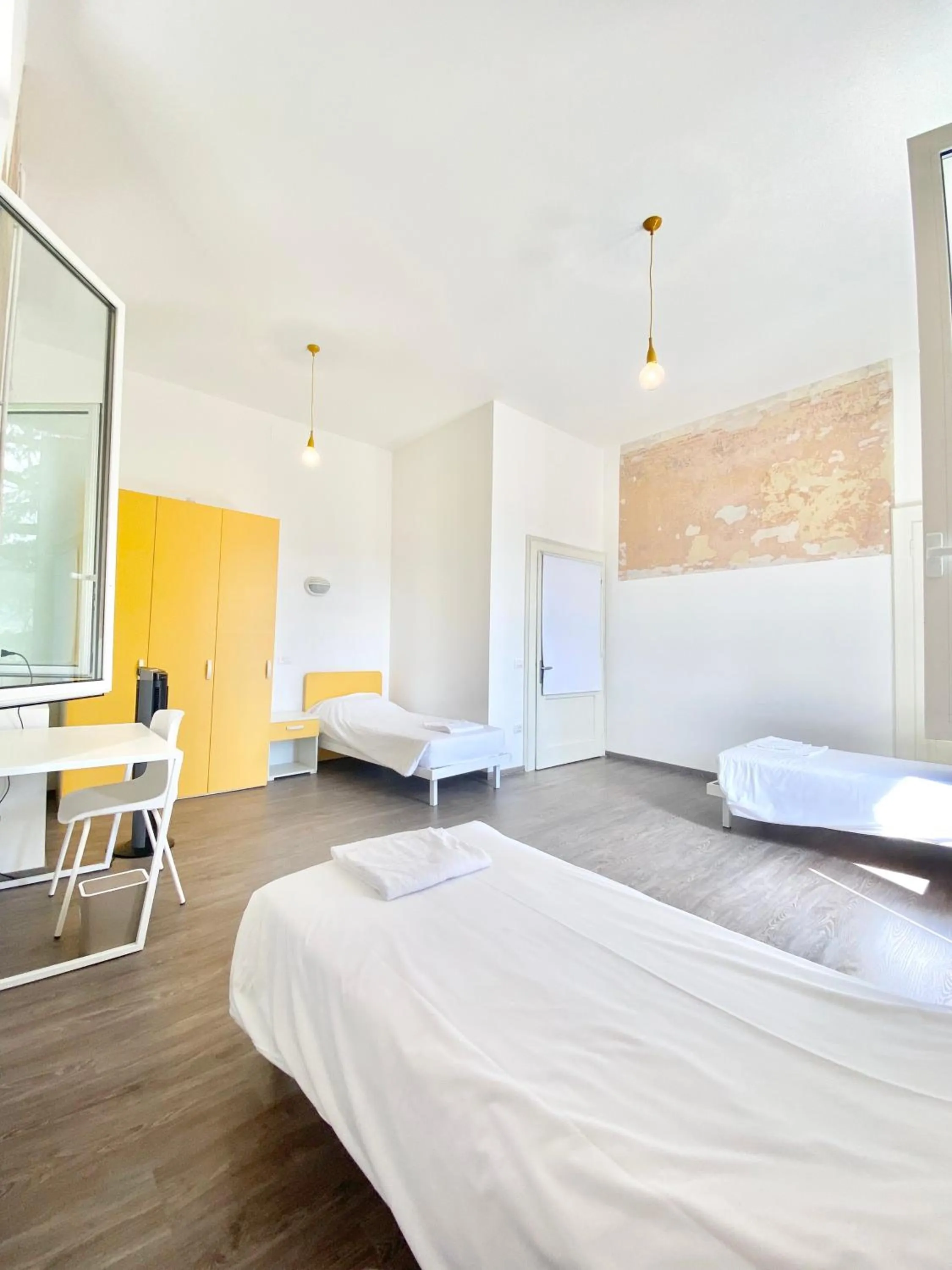 Photo of the whole room, Bed in BRIBANO HOSTEL & bike sharing-workers and tourists hospitality