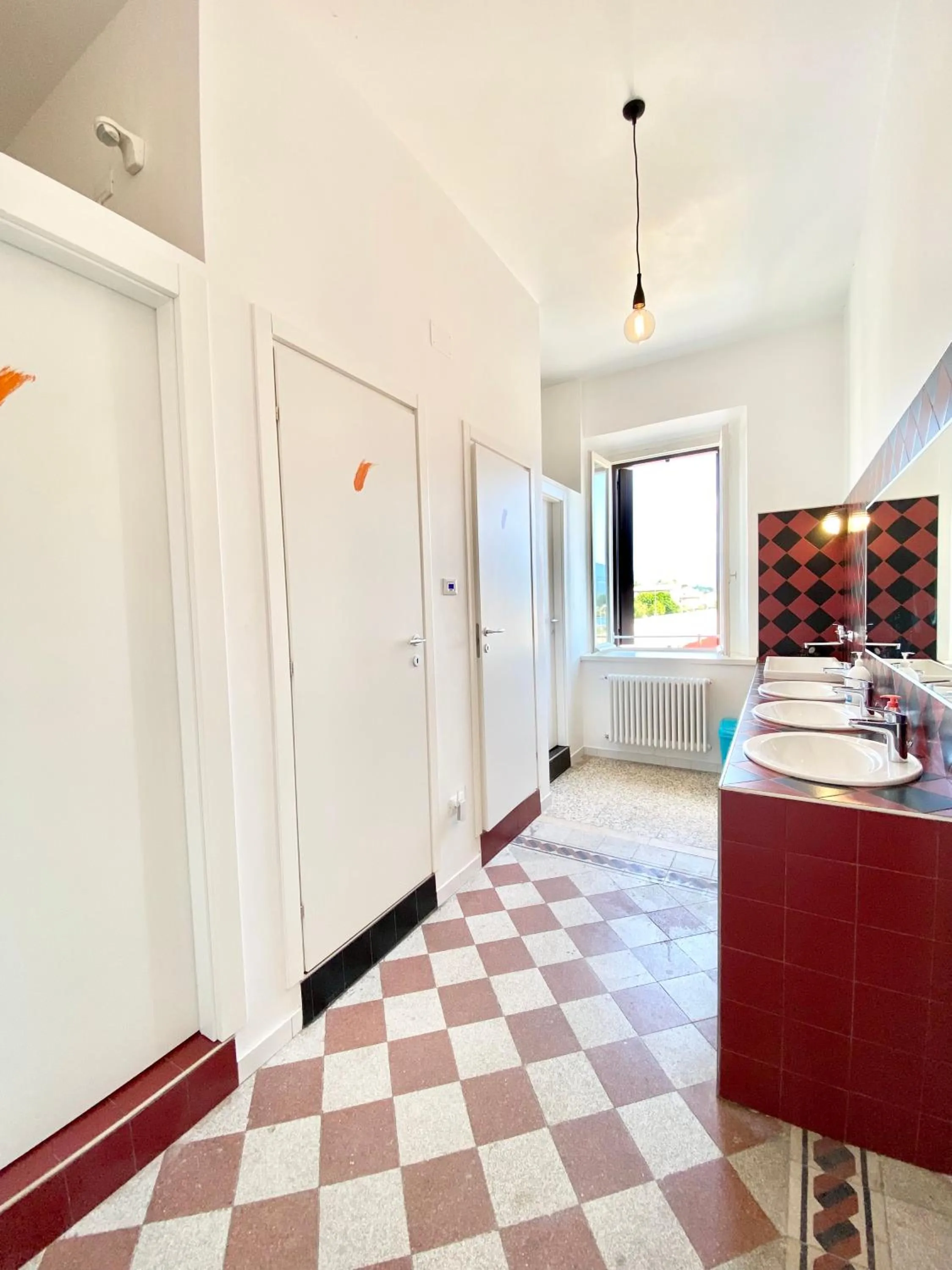 Bathroom in BRIBANO HOSTEL & bike sharing-workers and tourists hospitality