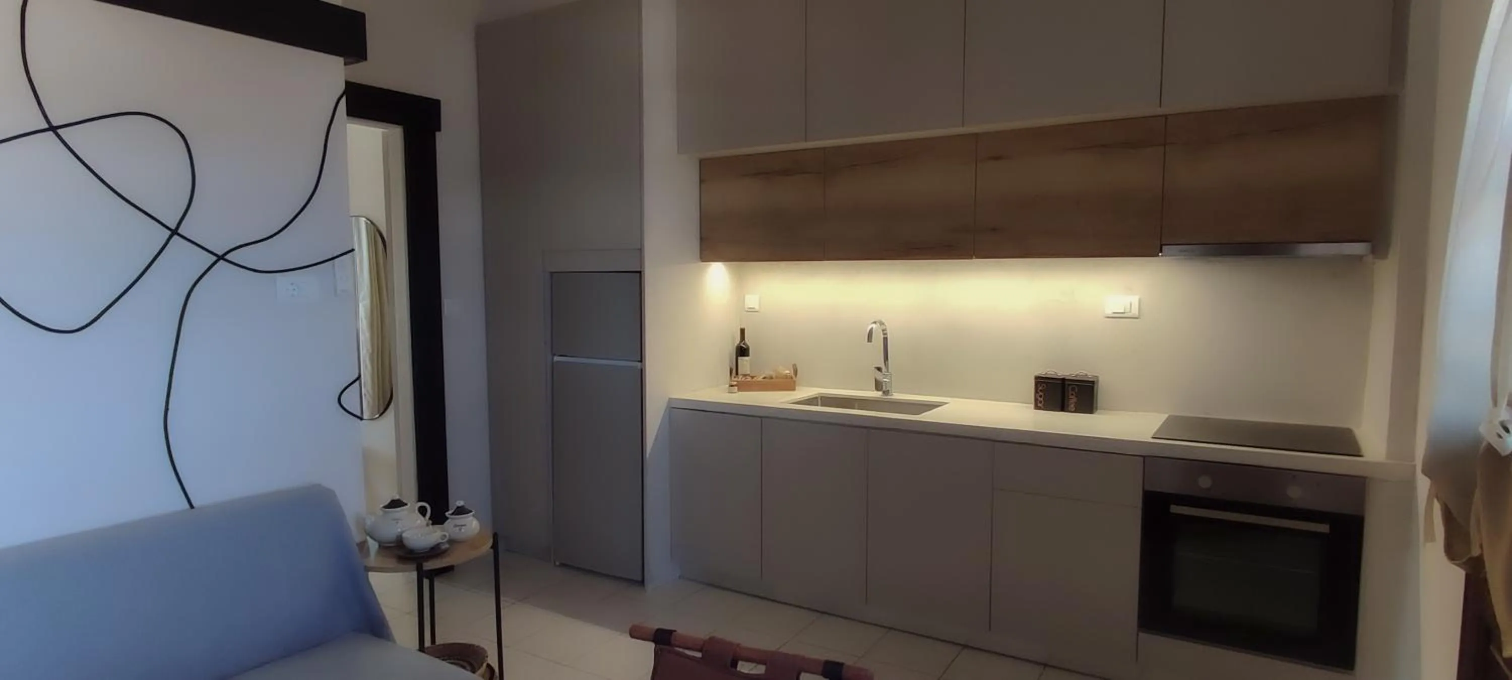 Kitchen or kitchenette in Niki Apartments