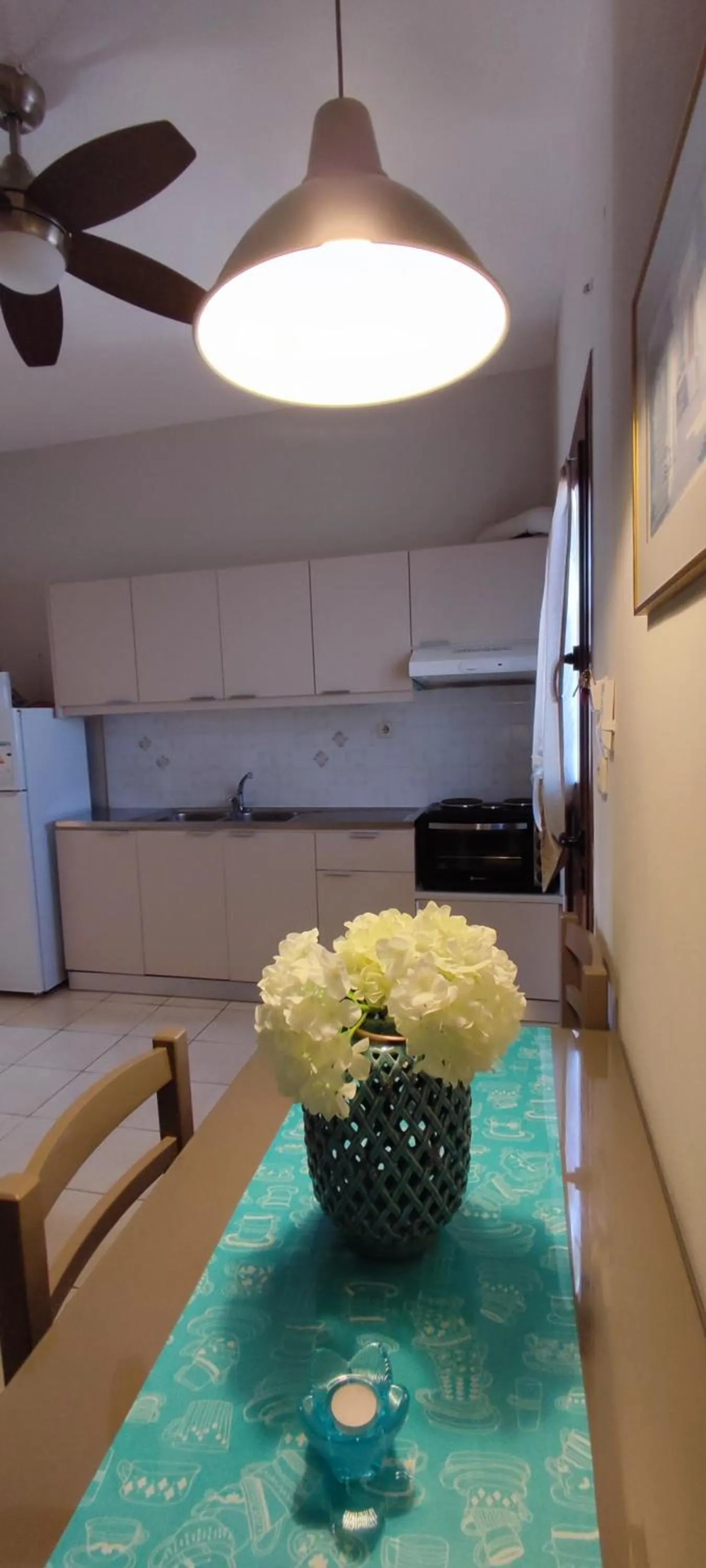 Kitchen or kitchenette in Niki Apartments