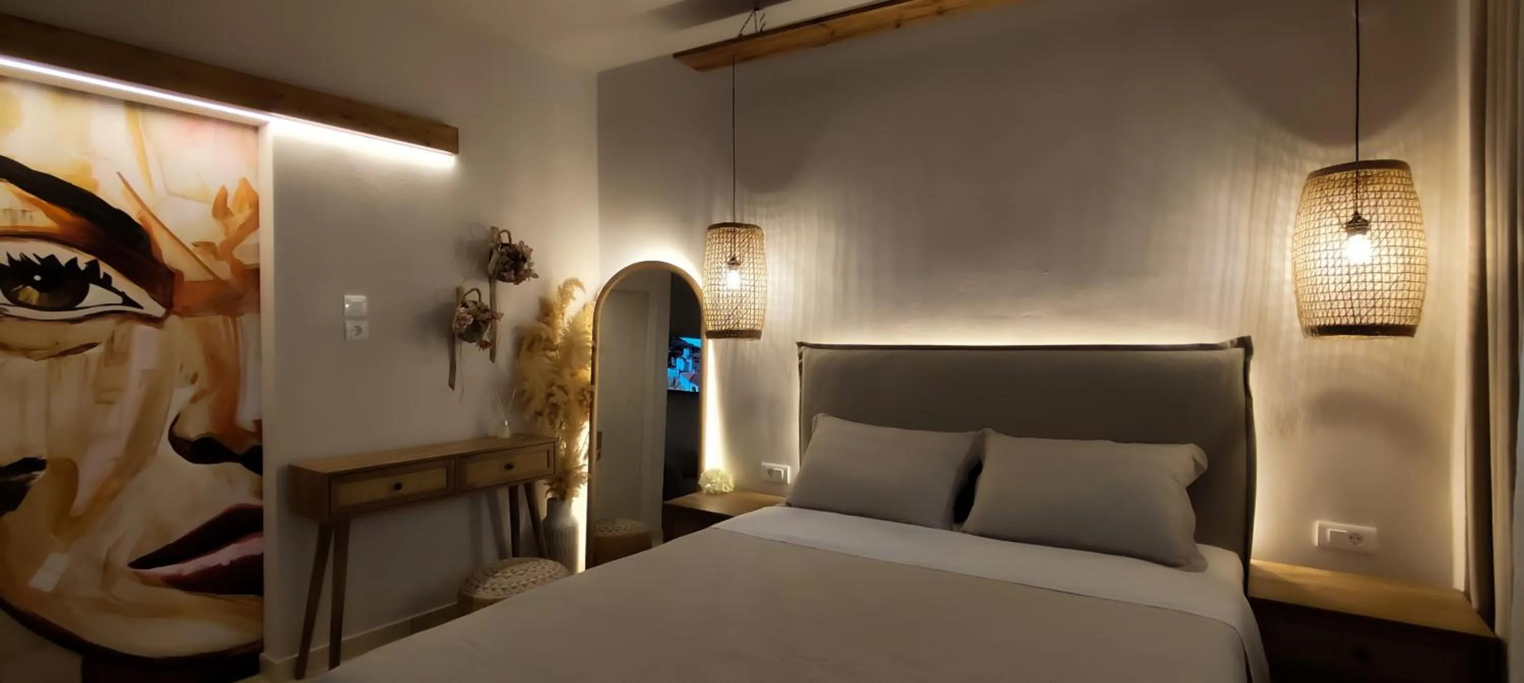 Bed in Niki Apartments