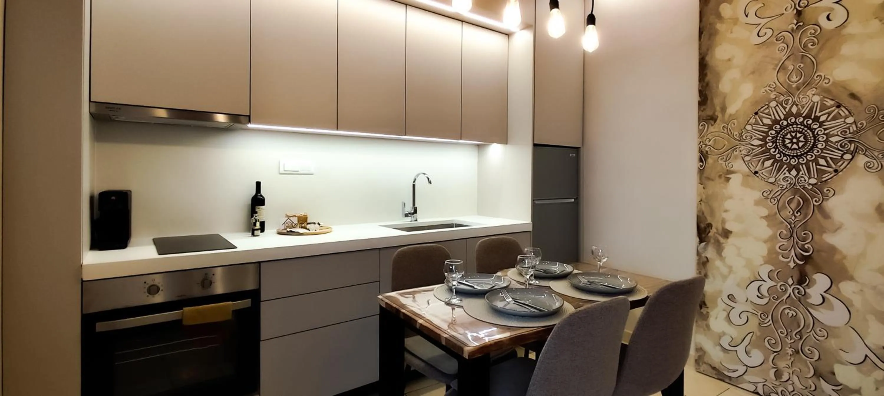 Kitchen or kitchenette in Niki Apartments