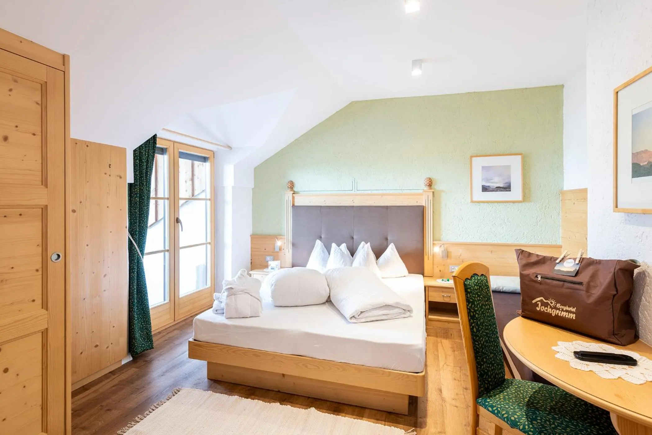 Bed in Berghotel Jochgrimm - Your Dolomites Home