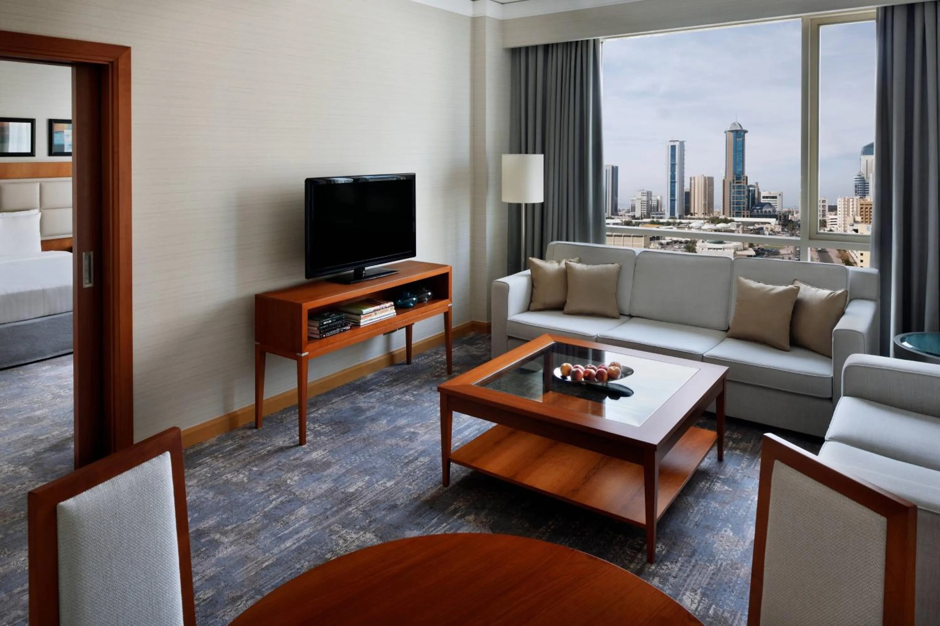 Living room in Courtyard By Marriott Kuwait City