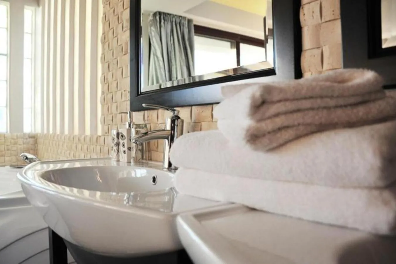 Bathroom in Catembe Gallery Hotel