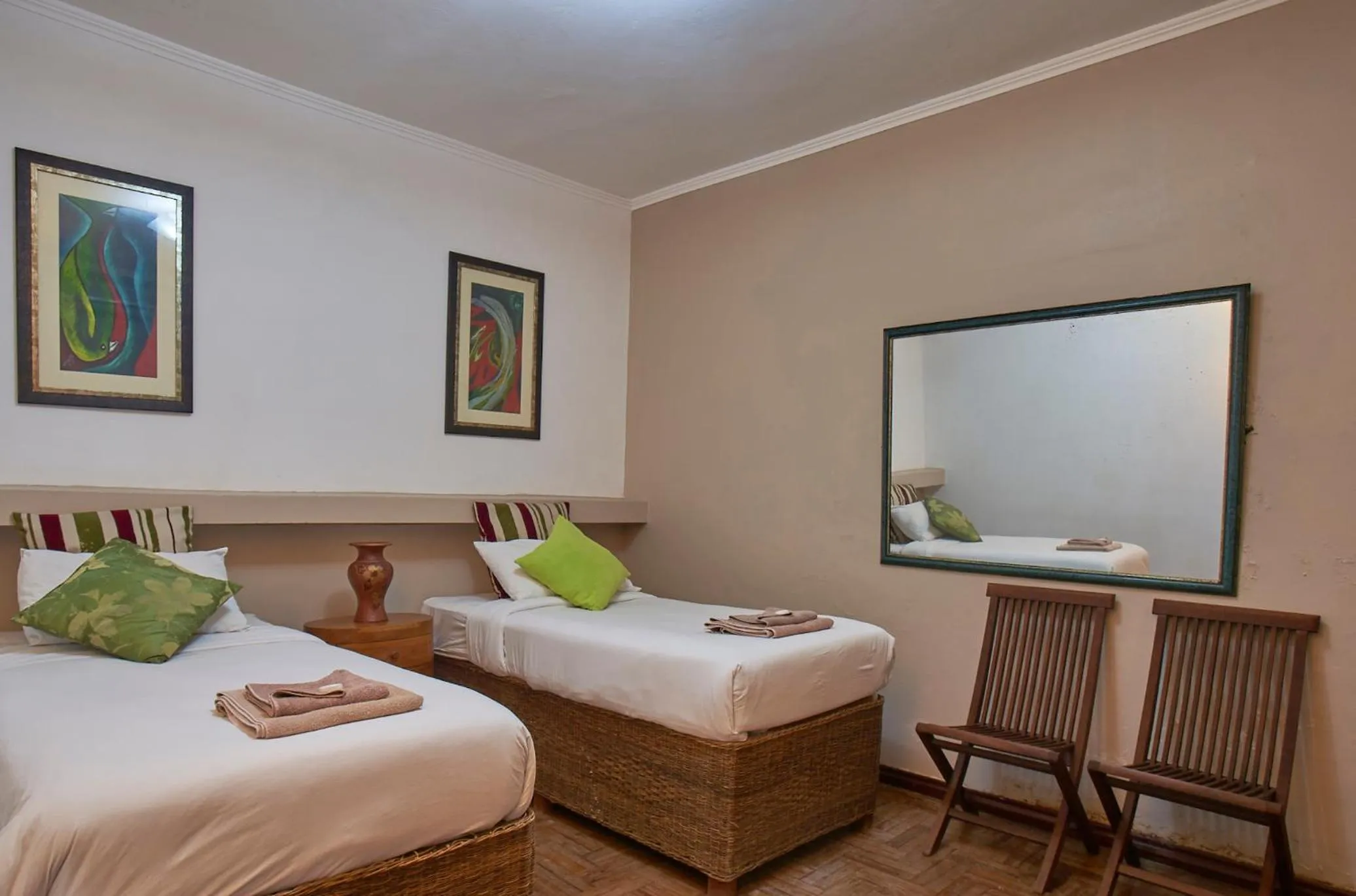 Bed in Catembe Gallery Hotel