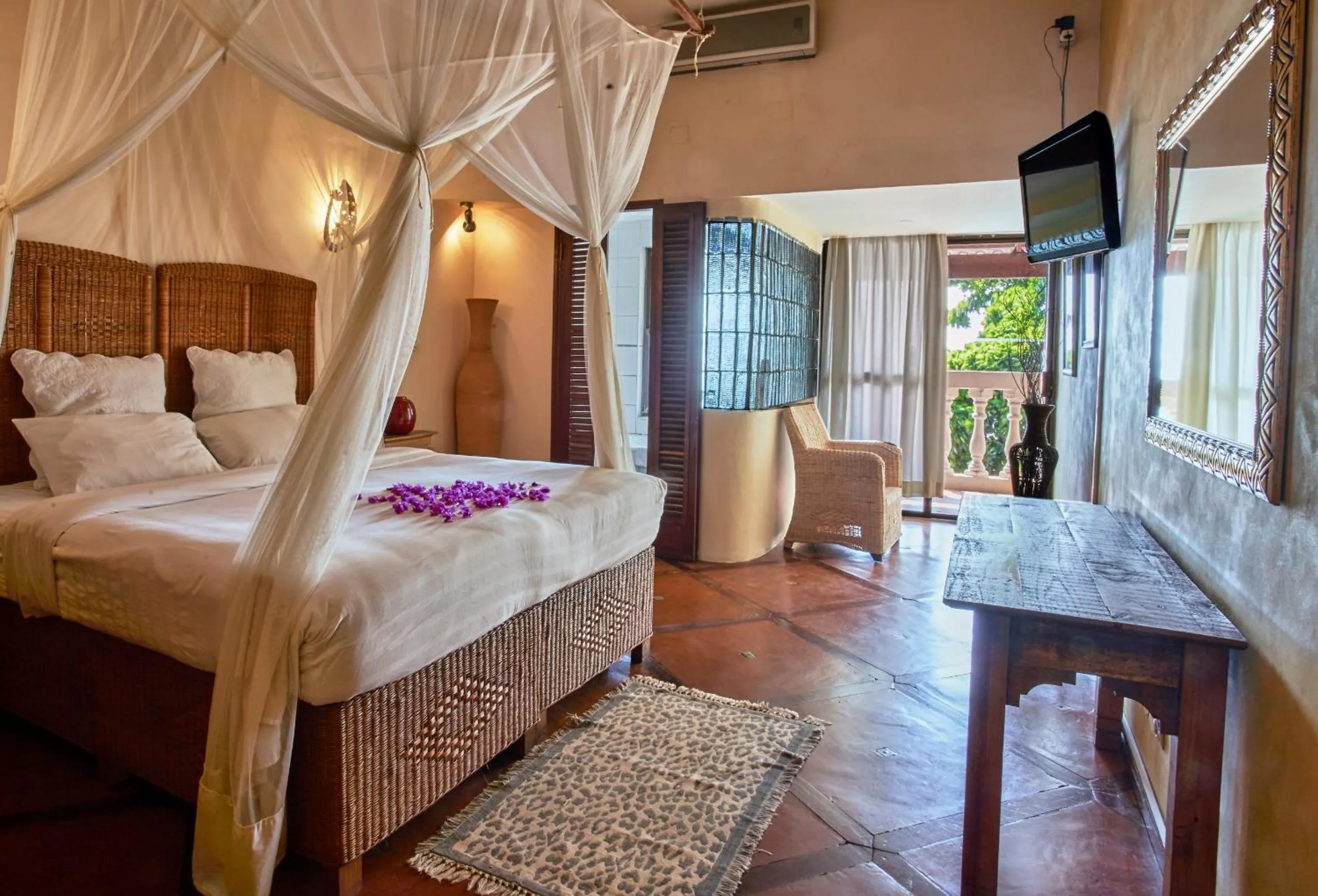 Bed in Catembe Gallery Hotel