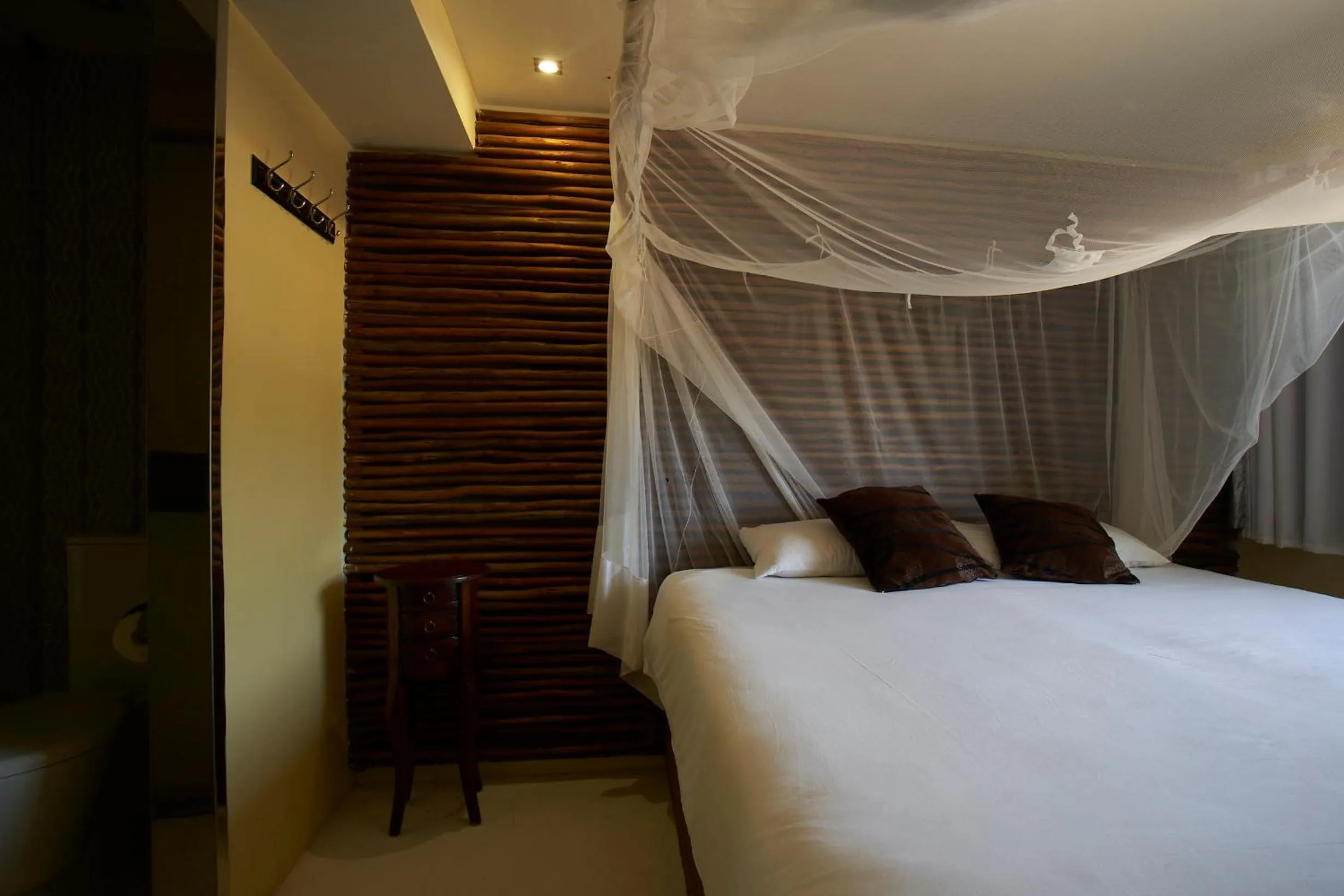 Bed in Catembe Gallery Hotel