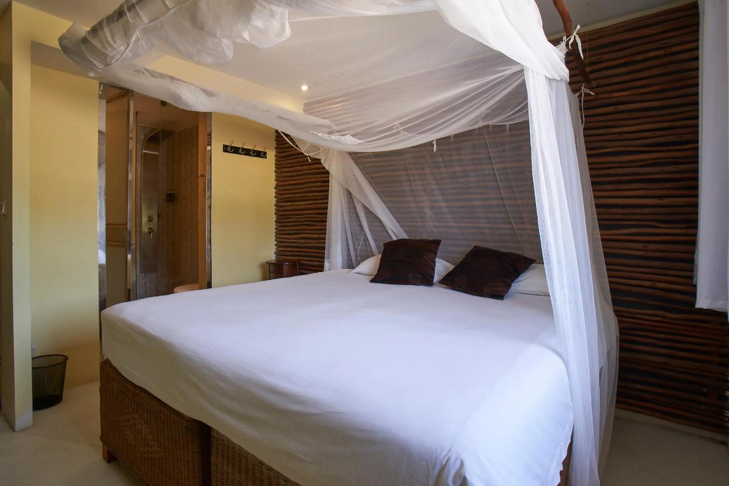 Bed in Catembe Gallery Hotel