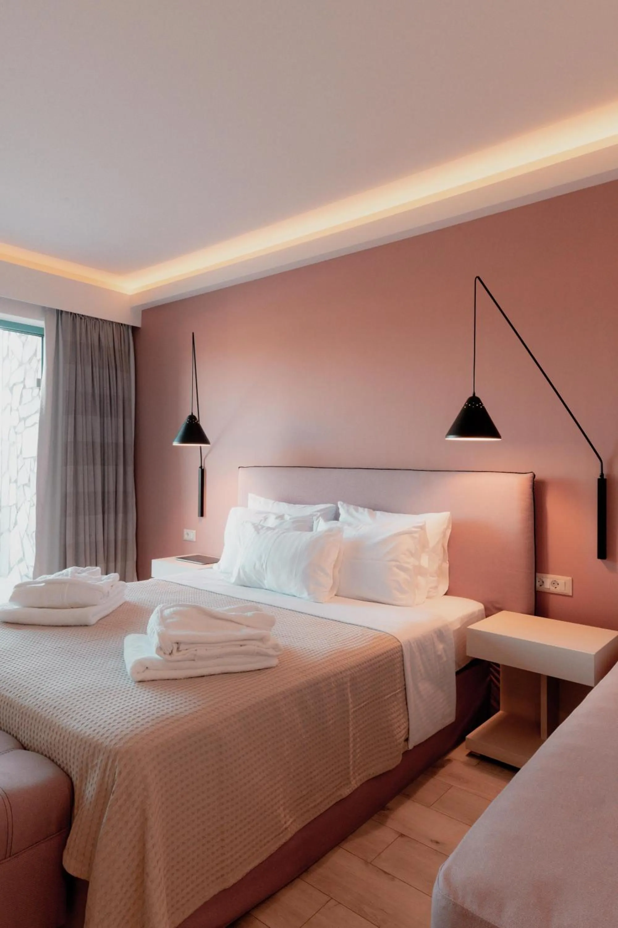 Bed in Palacio del Sol Luxury Apartments
