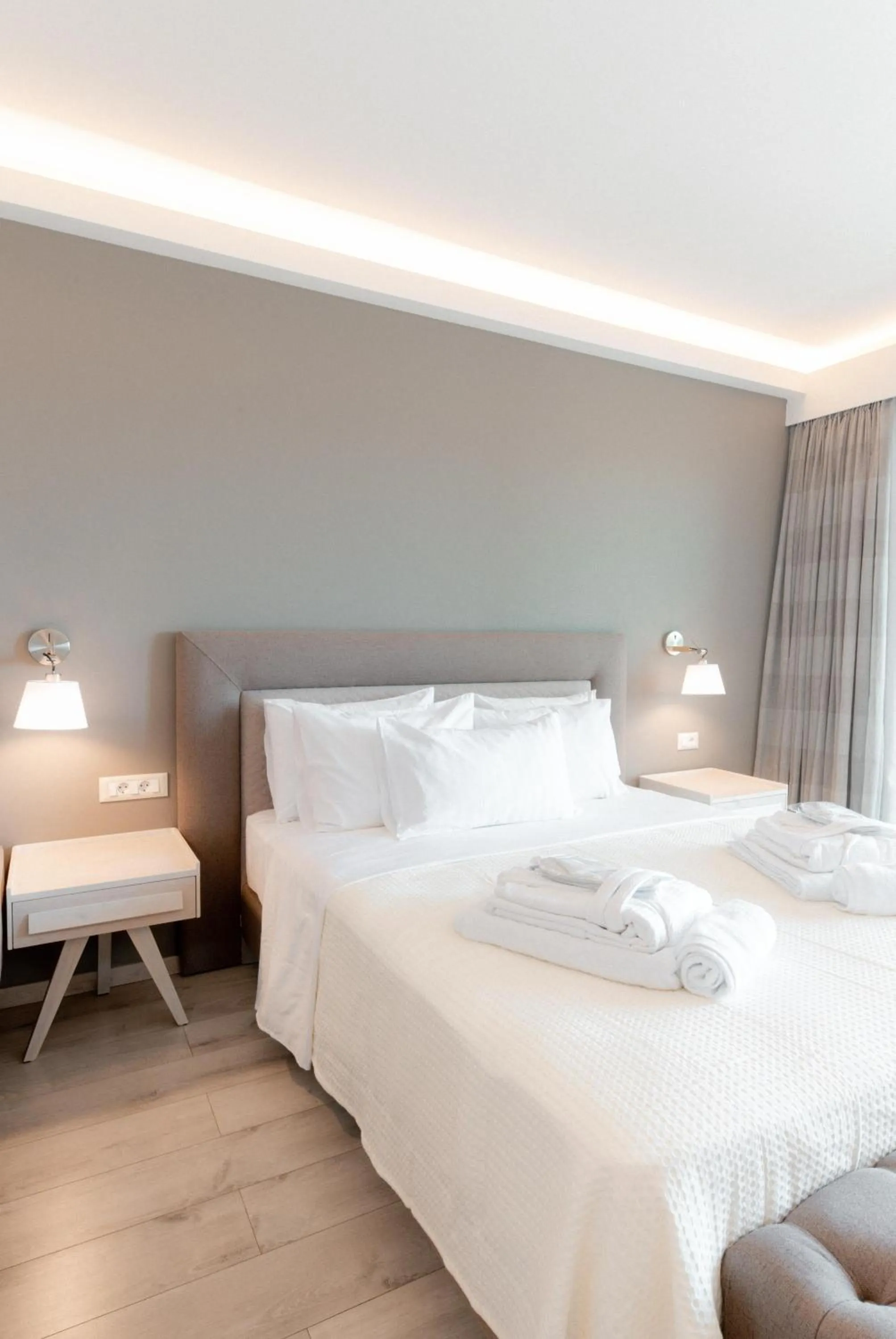 Bed in Palacio del Sol Luxury Apartments
