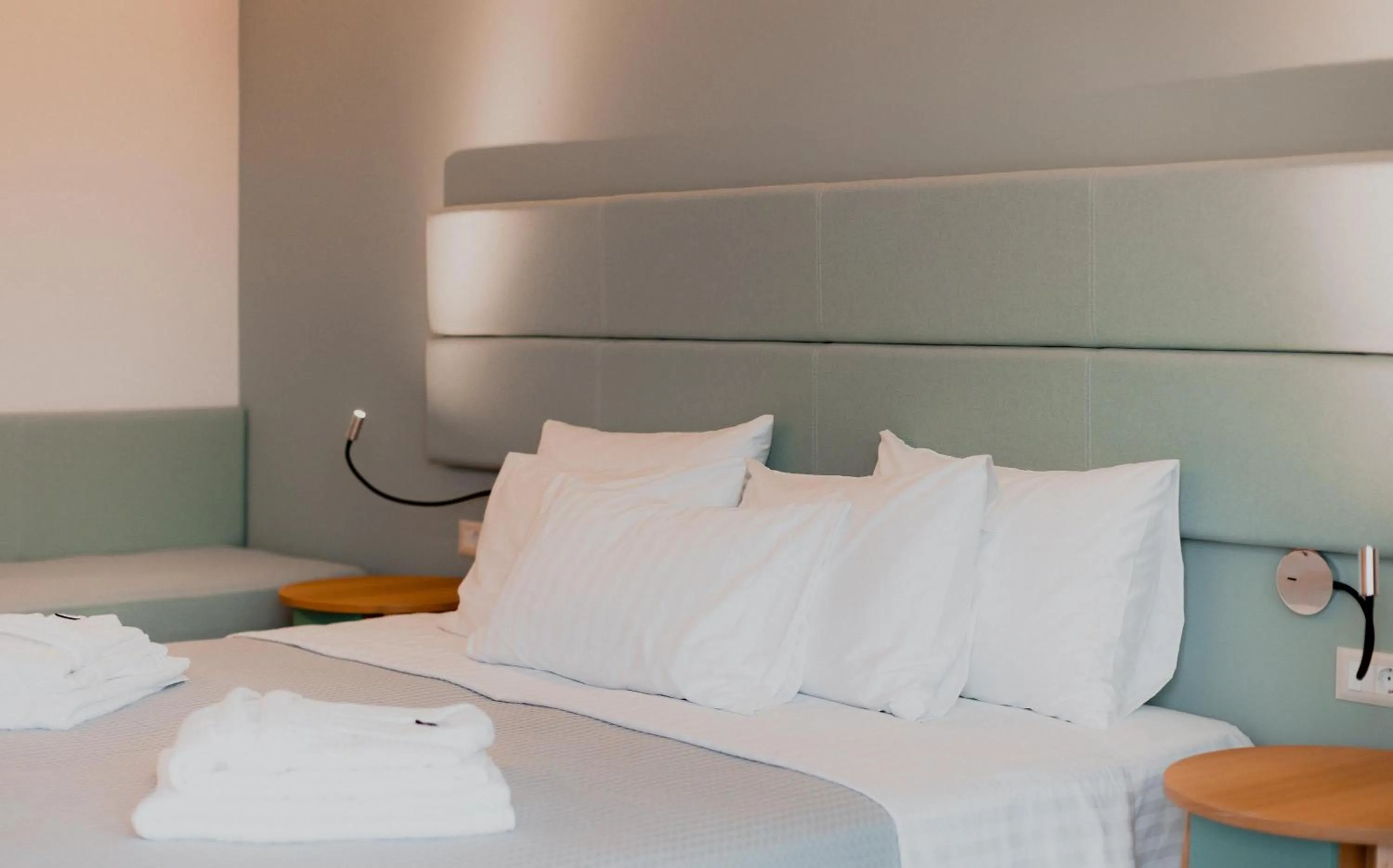 Bed in Palacio del Sol Luxury Apartments