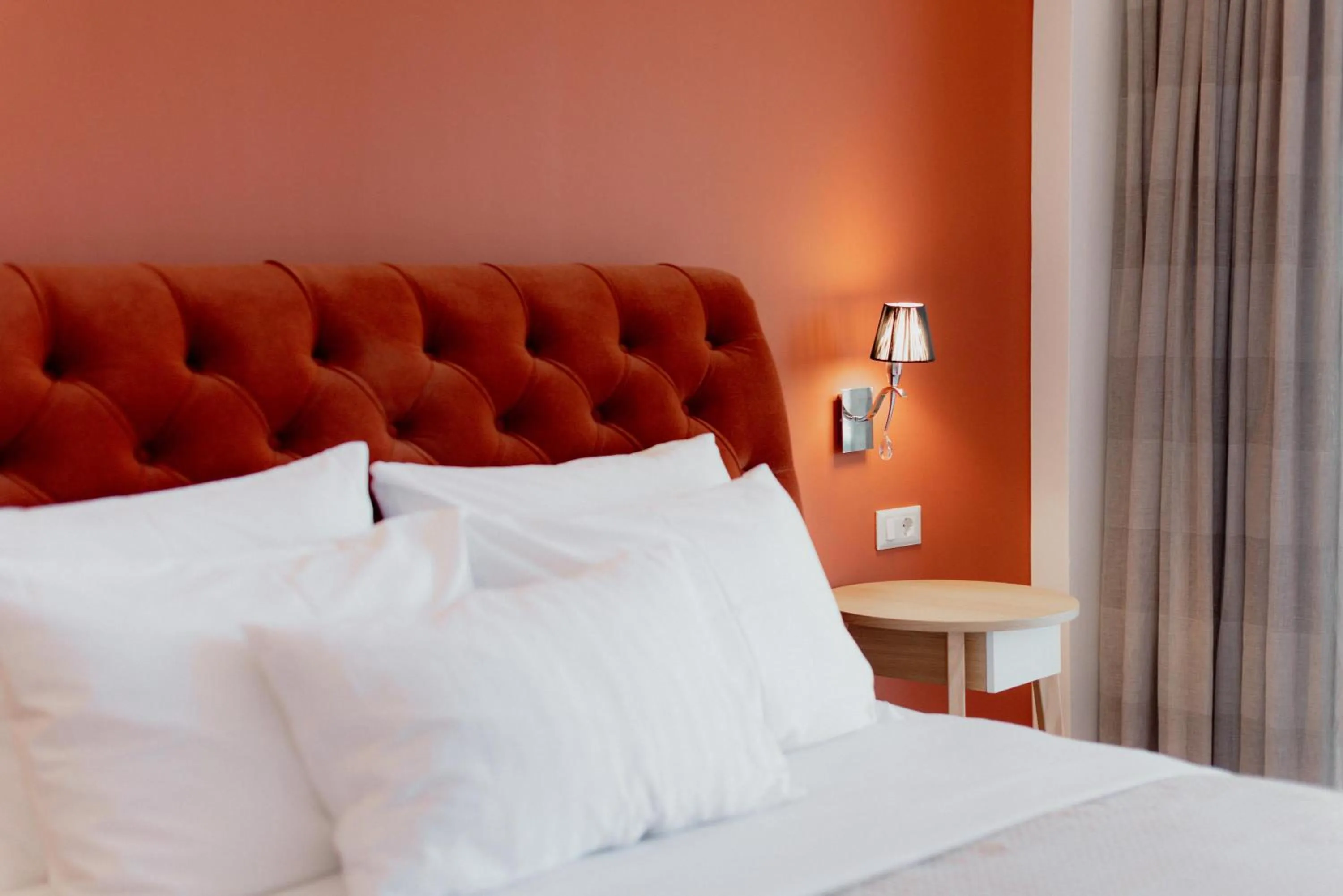 Bed in Palacio del Sol Luxury Apartments