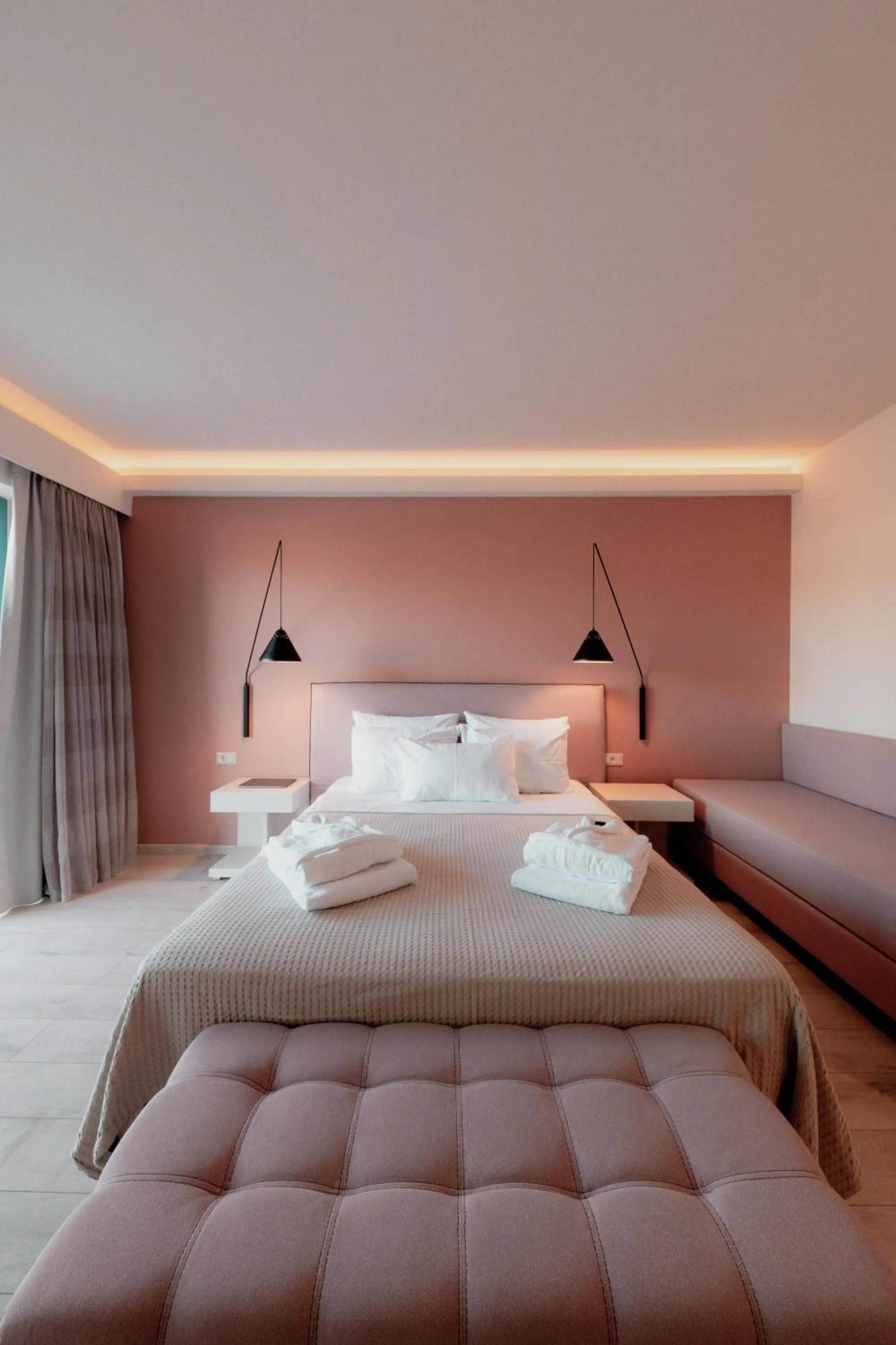 Bed in Palacio del Sol Luxury Apartments