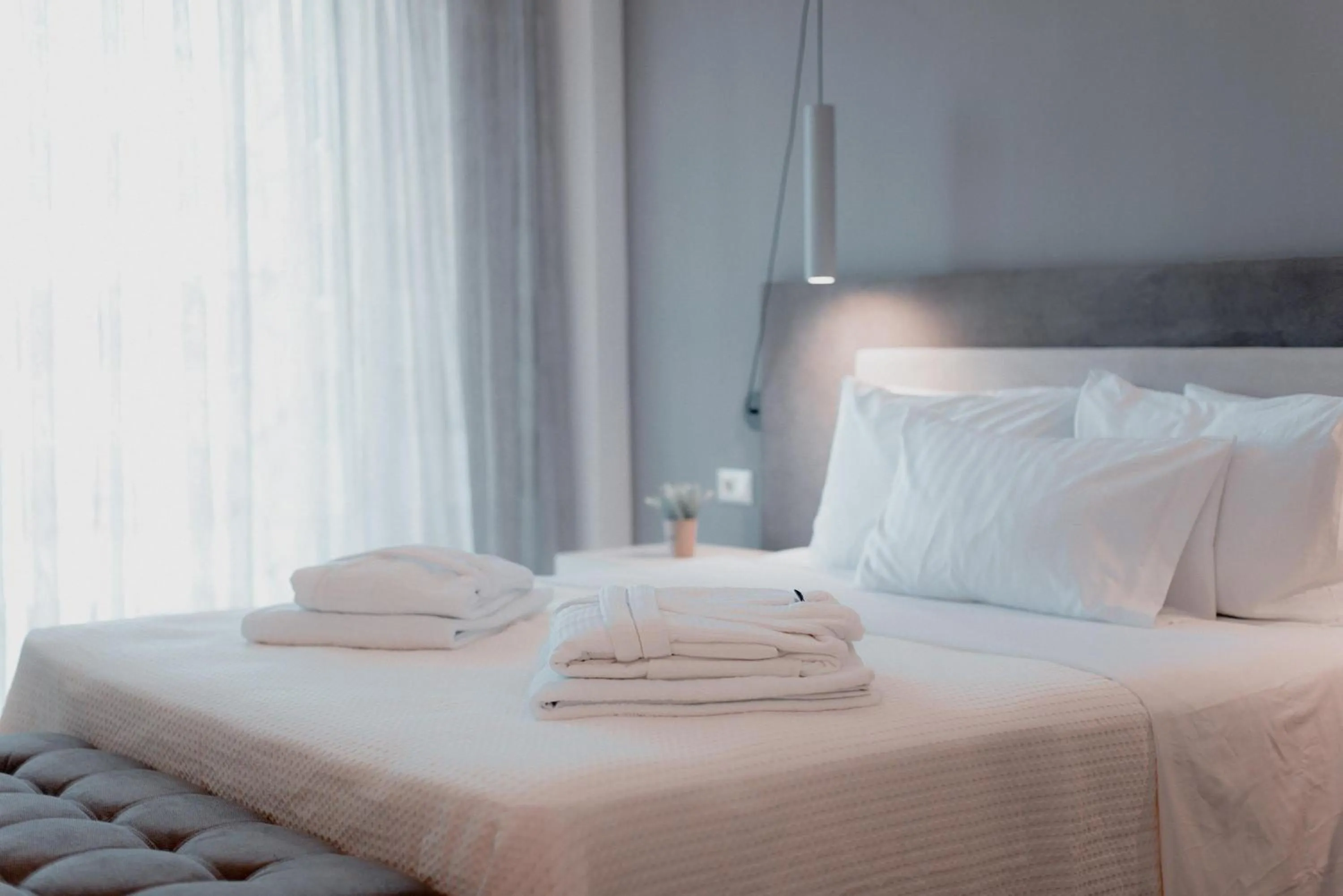 Bed in Palacio del Sol Luxury Apartments