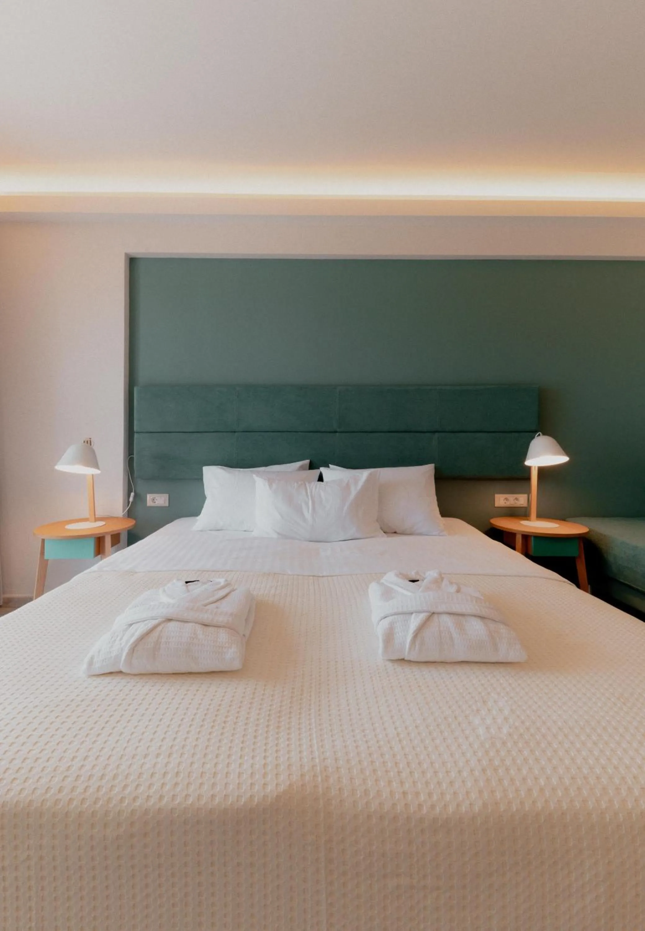 Bed in Palacio del Sol Luxury Apartments