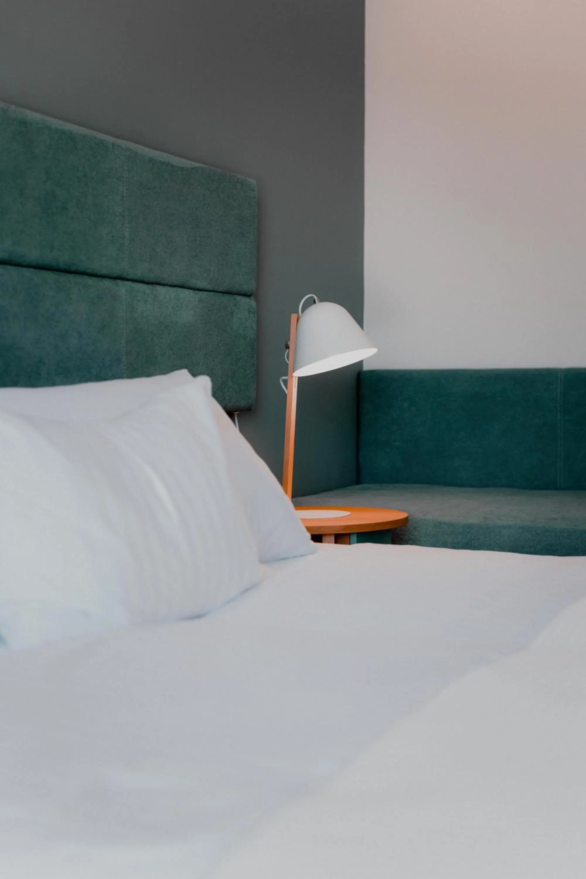 Bed in Palacio del Sol Luxury Apartments