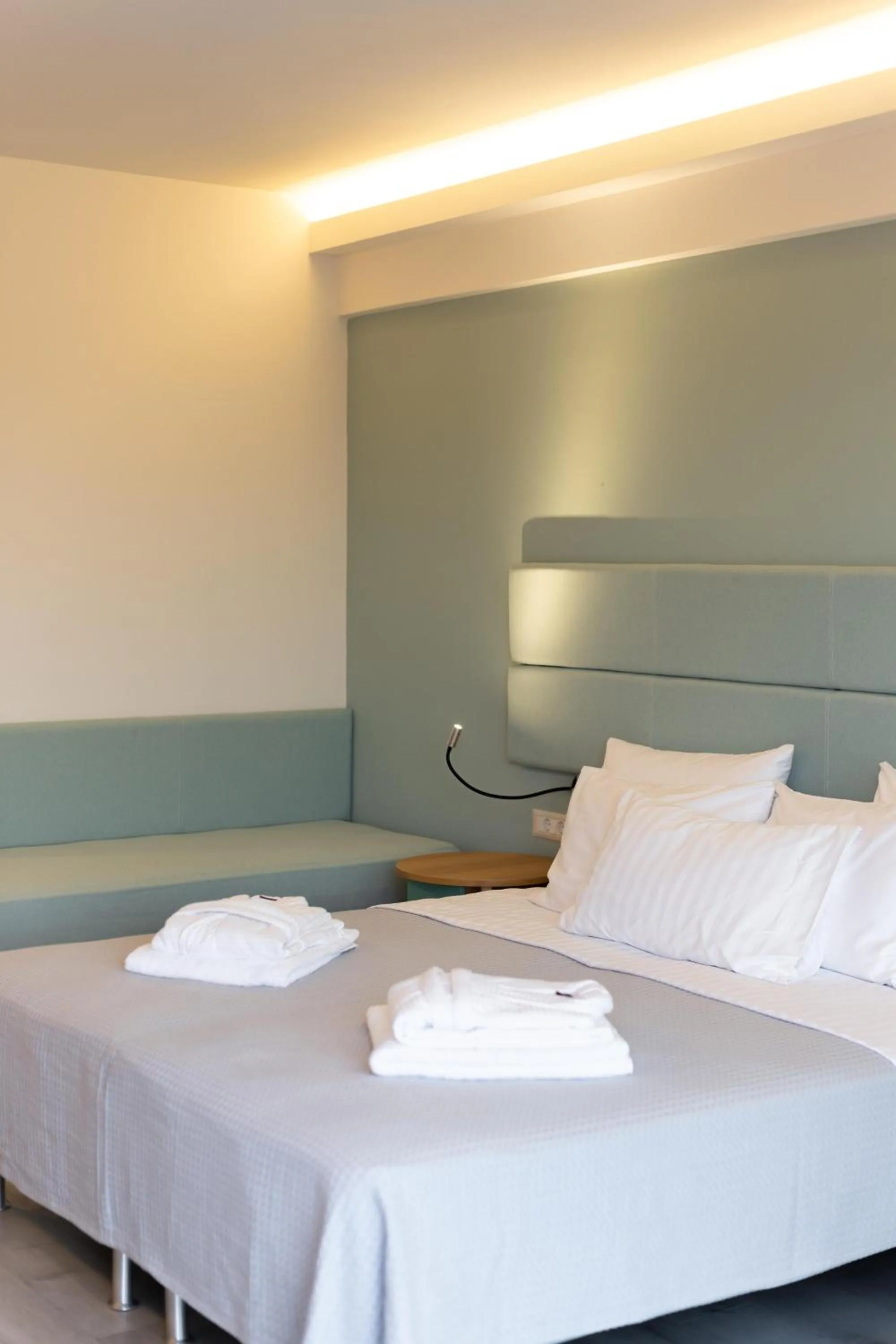 Bed in Palacio del Sol Luxury Apartments