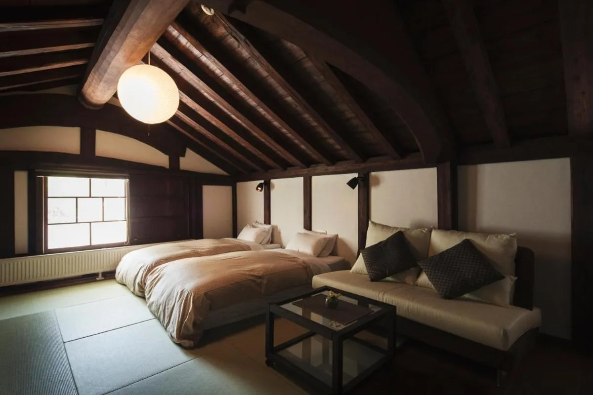 Bed in Takamiya Ryokan Miyamaso