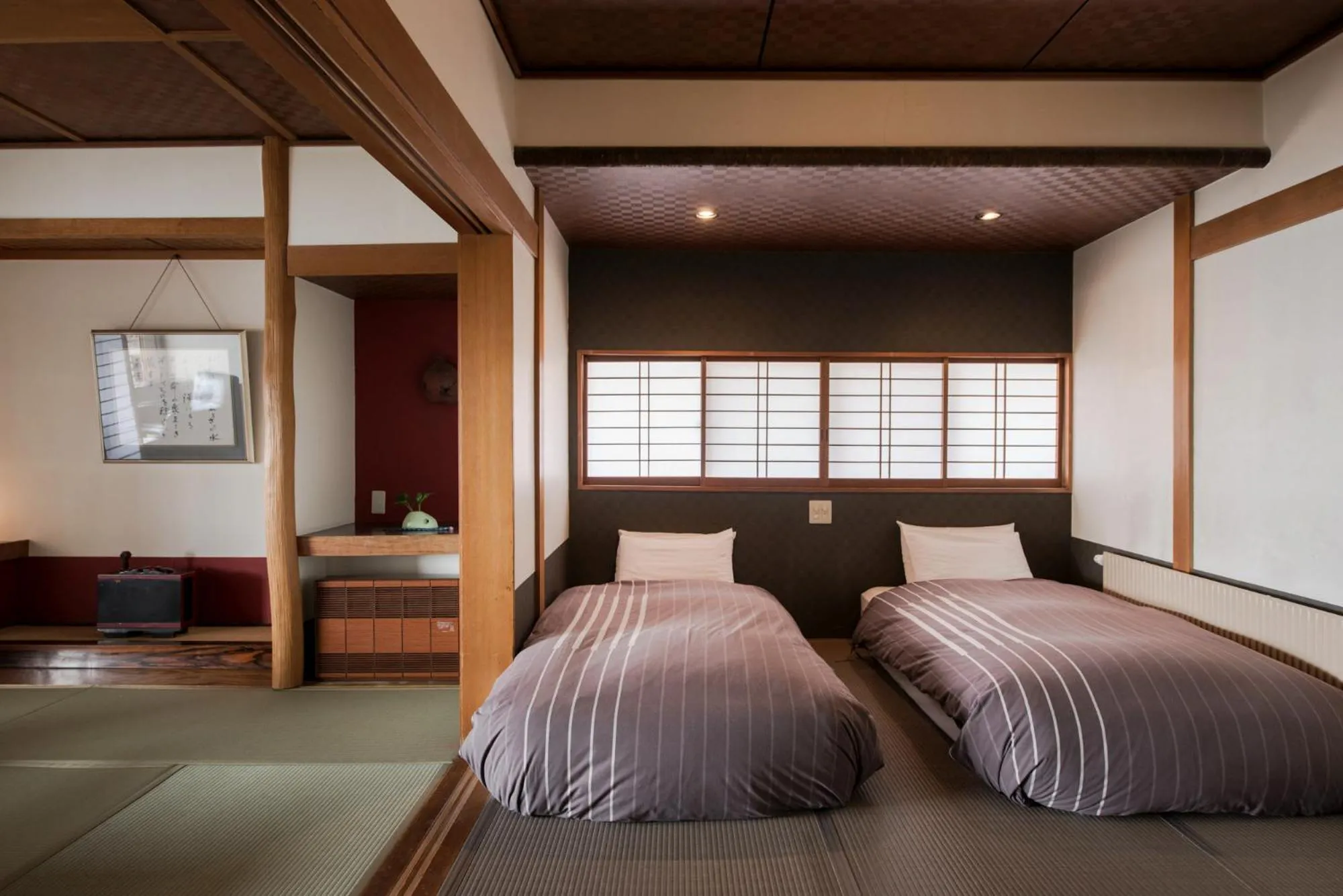 Bed in Takamiya Ryokan Miyamaso