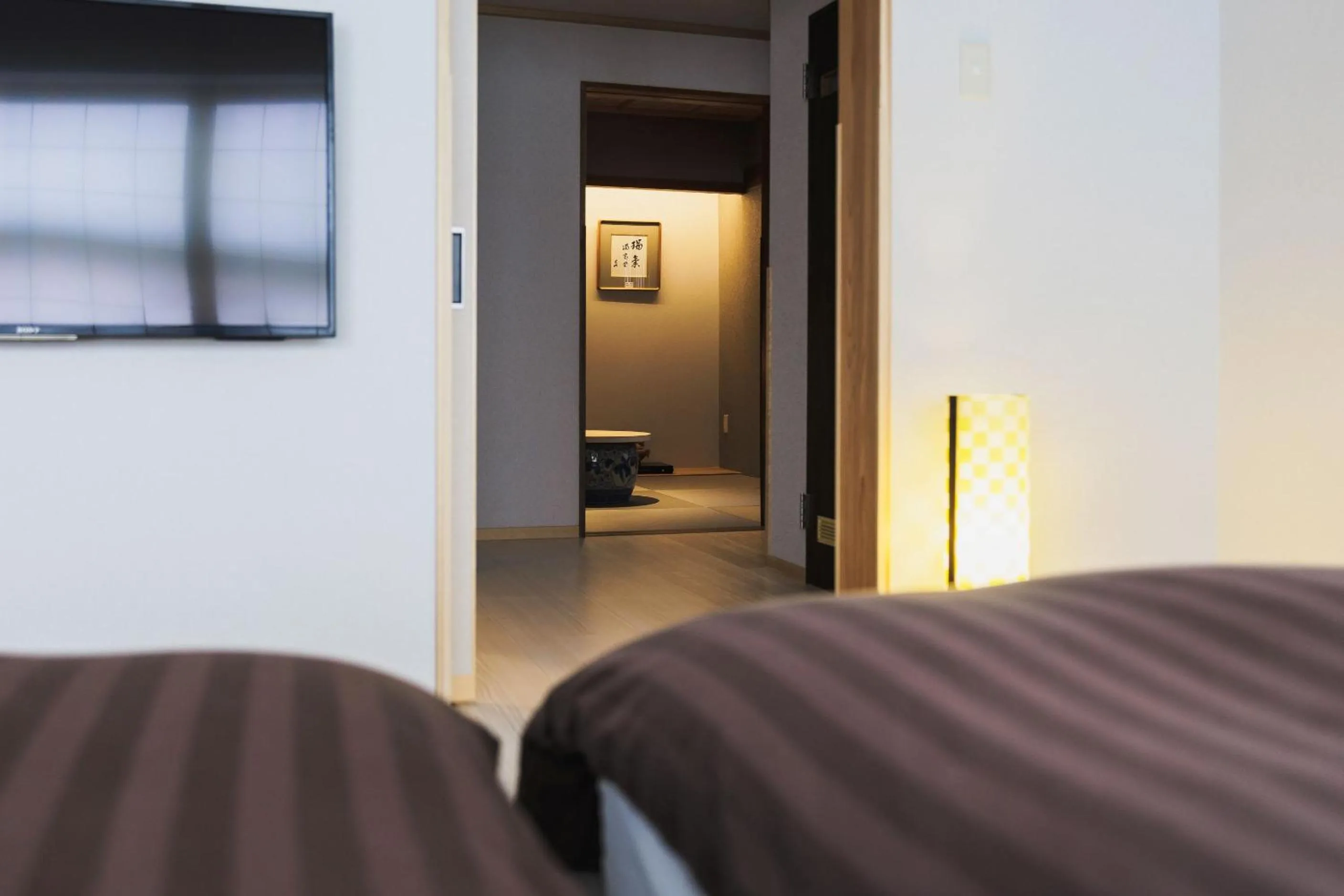 Bed in Takamiya Ryokan Miyamaso