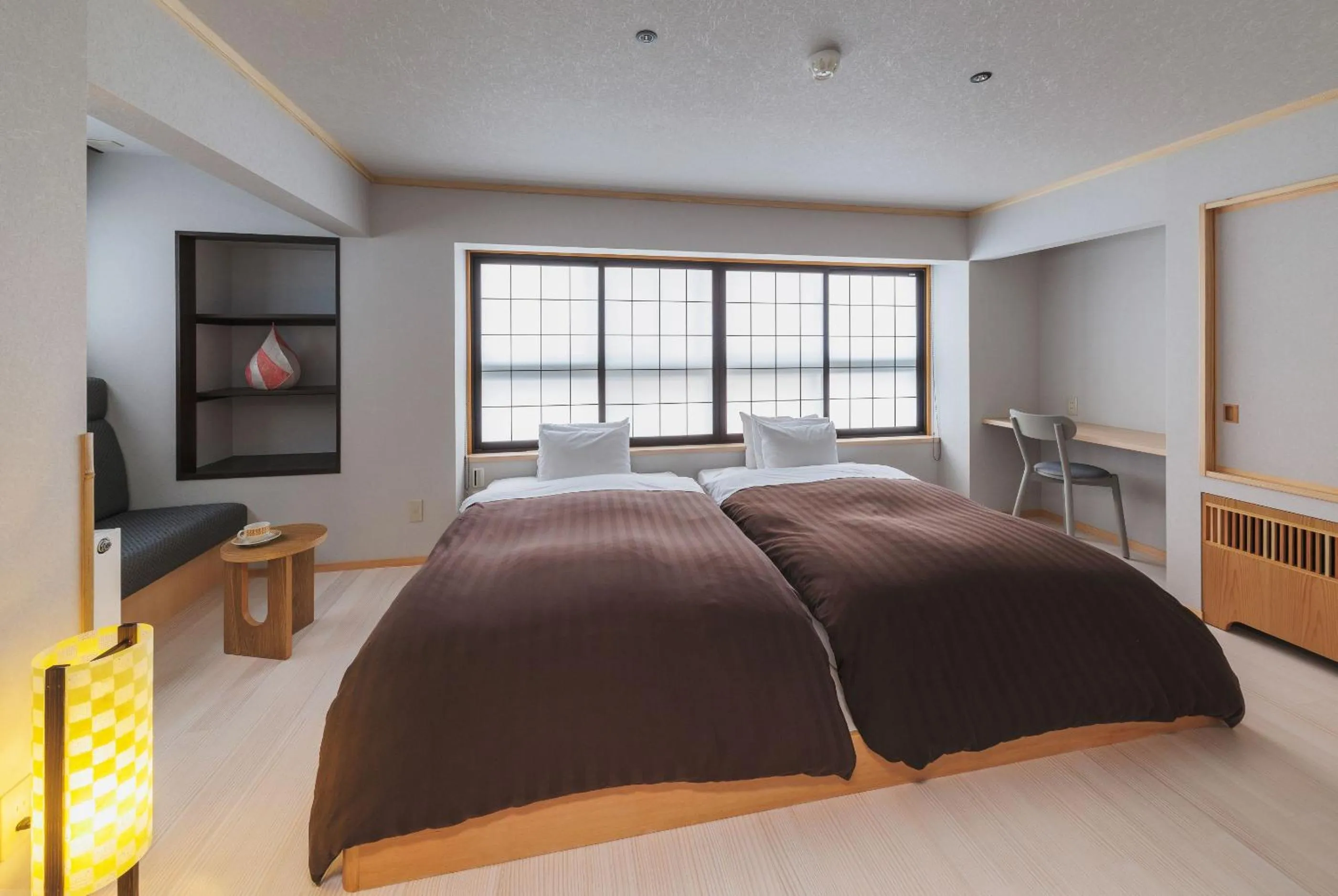 Bed in Takamiya Ryokan Miyamaso