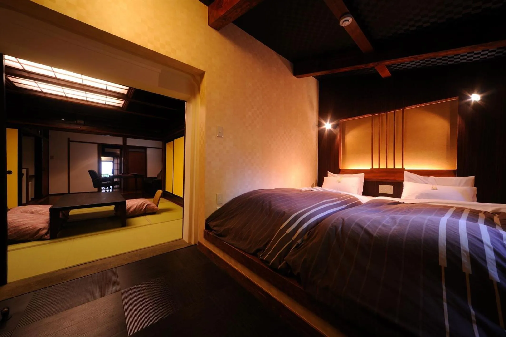 Bed in Takamiya Ryokan Miyamaso