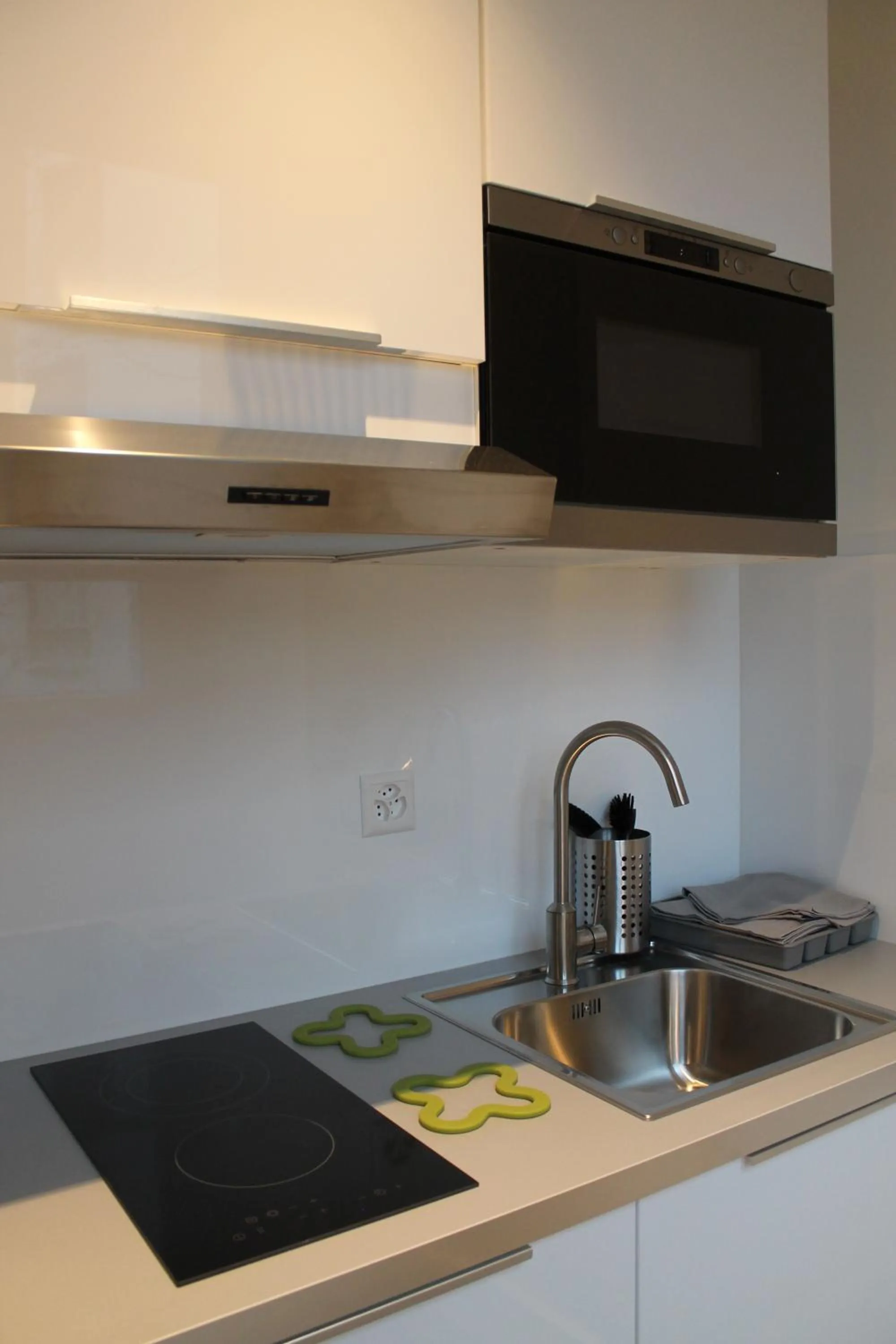 Kitchen or kitchenette in Hôtel Pax