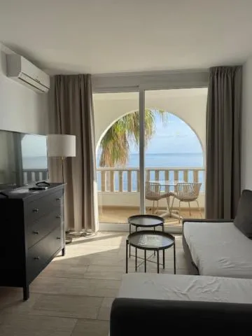 Living room, Bed in Orange Colom - Seaside Apartments